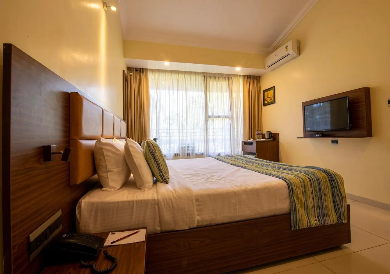 Photo of the whole room, Bed in Clarion Hotel Ocean Palms Goa