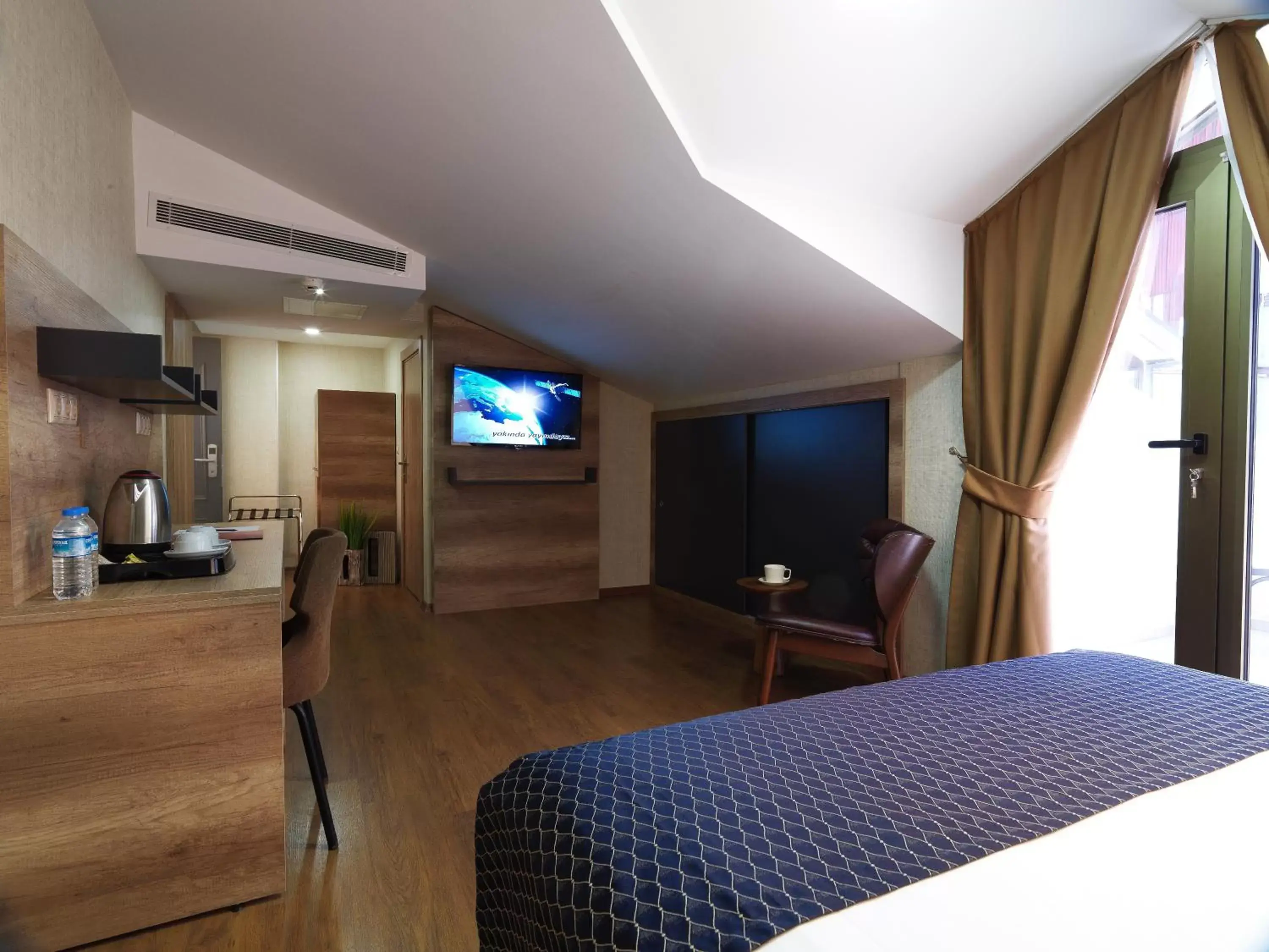 TV and multimedia, TV/Entertainment Center in Jaff Hotels & Spa Nisantasi