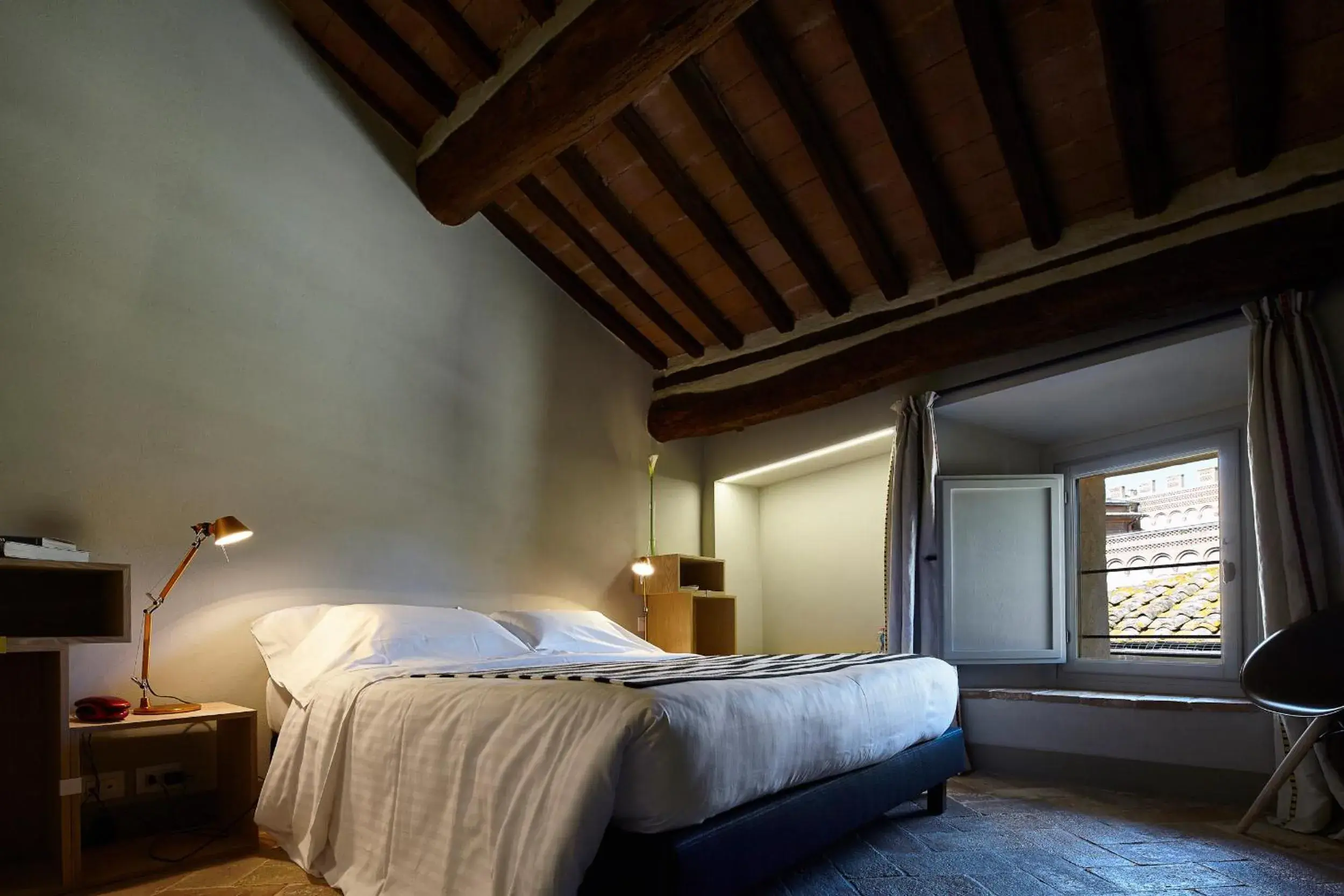 Bed in Palazzetto Rosso - Art Hotel