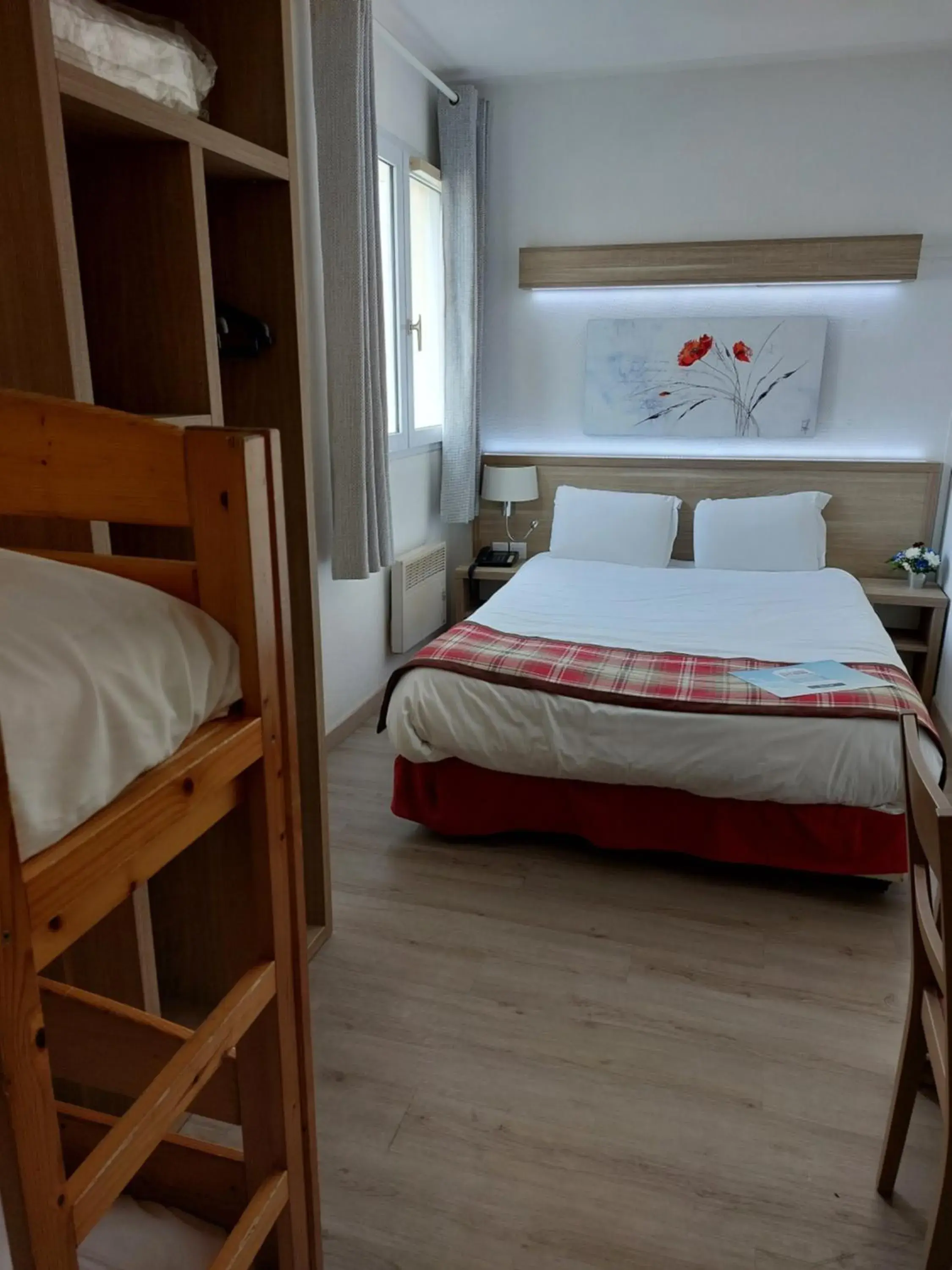 Bed in Kyriad Hotel - Restaurant Carentan