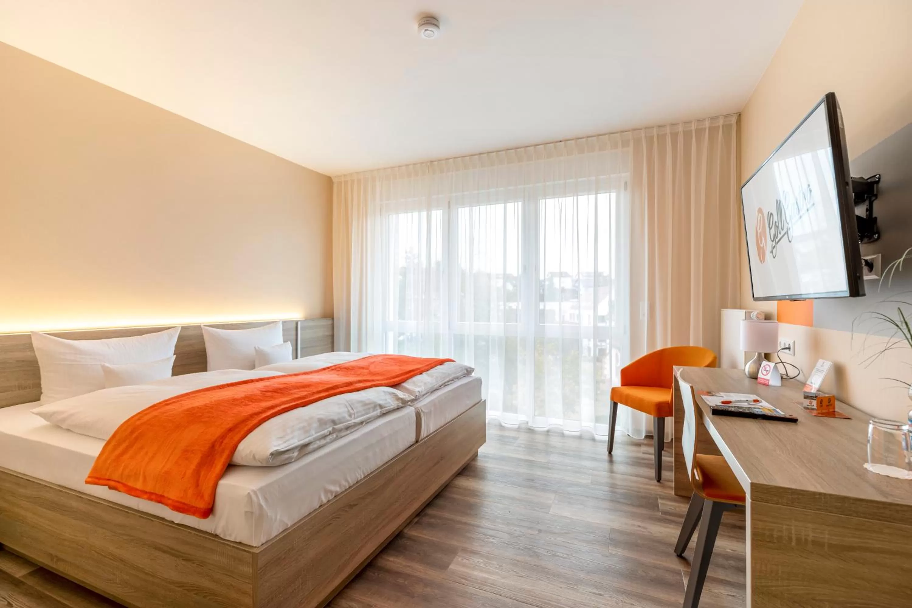 Photo of the whole room, Bed in Hotel Goll Pforzheim-Niefern