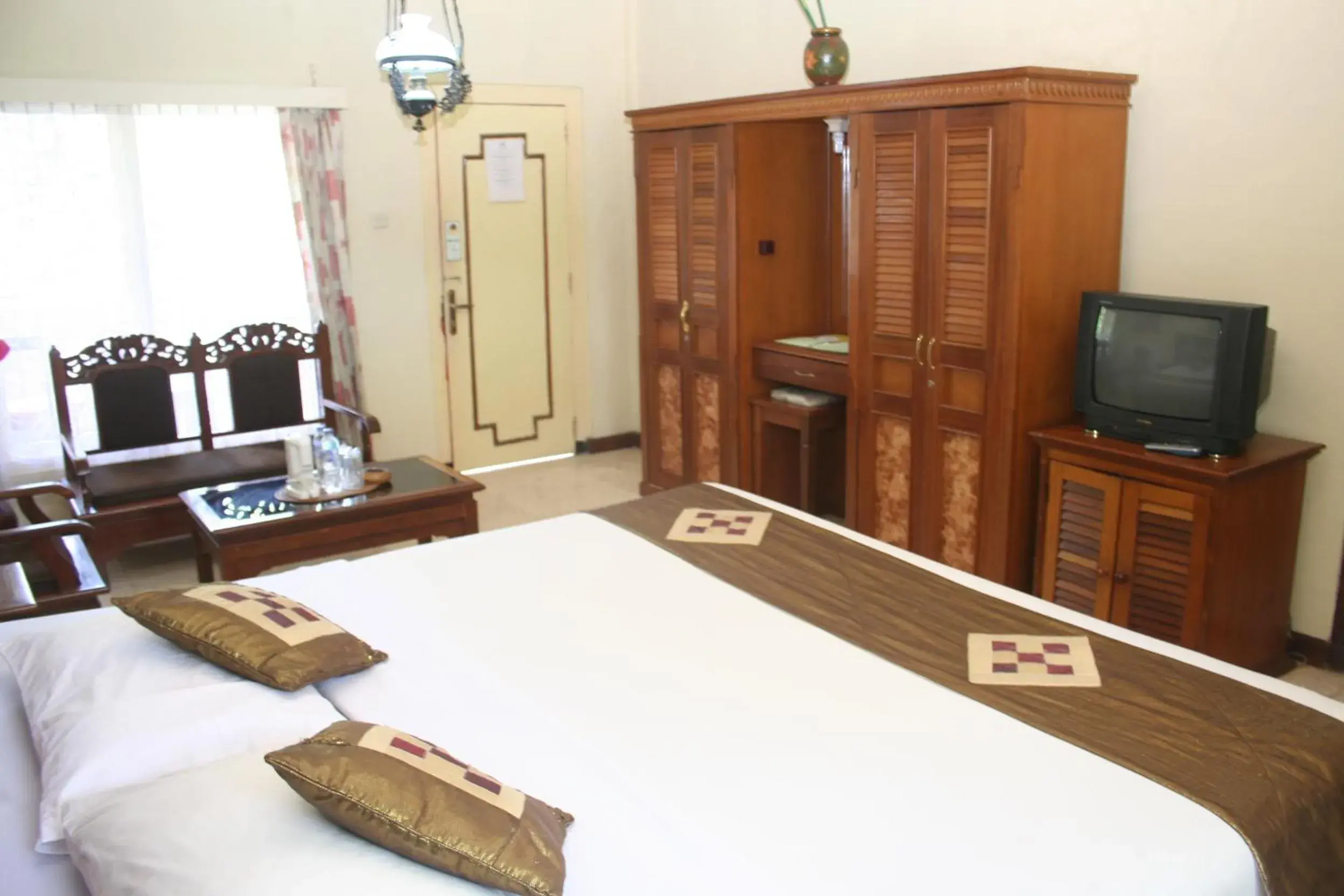 Bedroom, TV/Entertainment Center in Melasti Kuta Bungalows & Spa