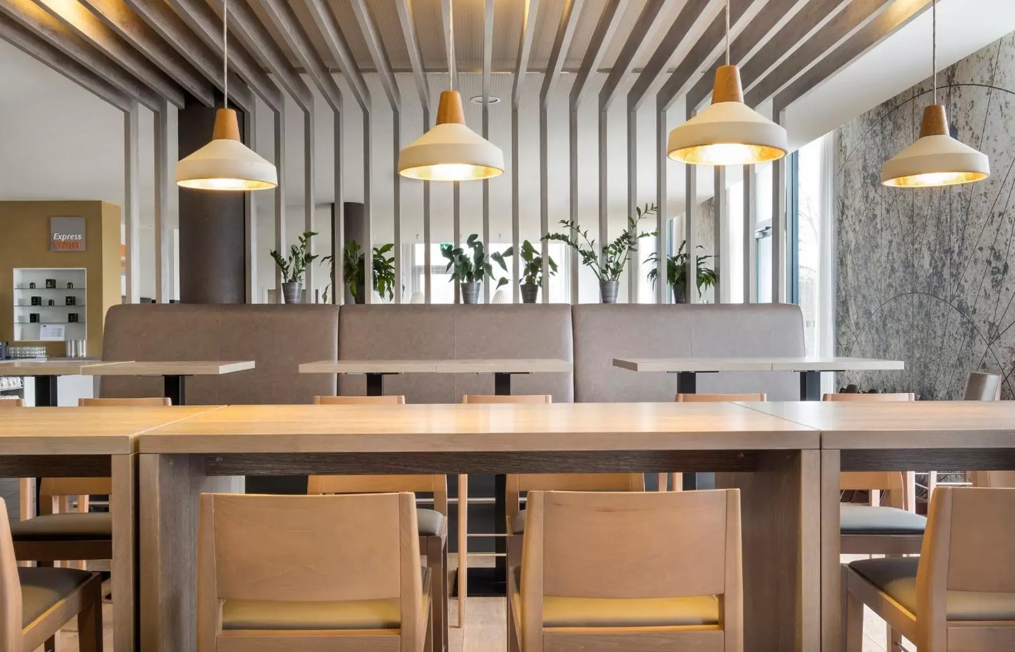 Lounge or bar in Holiday Inn Express Friedrichshafen by IHG Lounge or bar in Holiday Inn Express Friedrichshafen by IHG