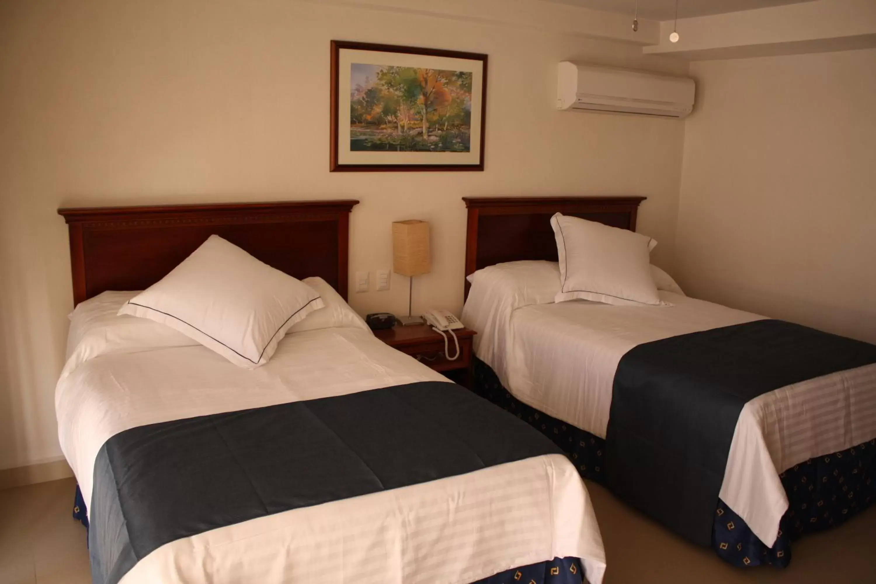 Photo of the whole room, Bed in Hotel Porto Allegro Puerto Vallarta