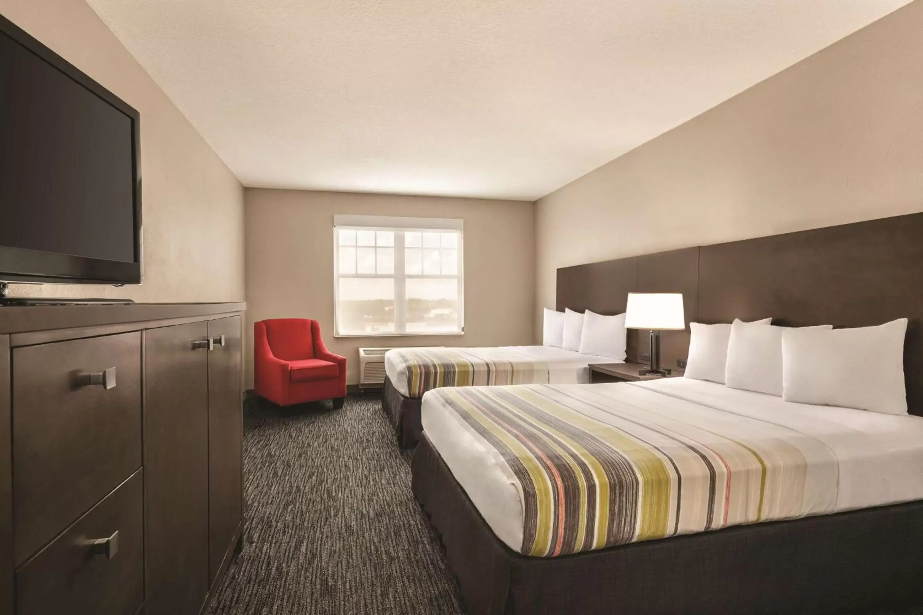 Photo of the whole room, Bed in Country Inn & Suites by Radisson, Tampa/Brandon, FL