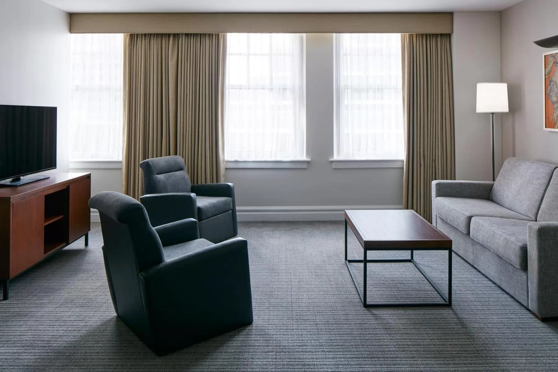 Seating area in Club Quarters Hotel Downtown, Houston