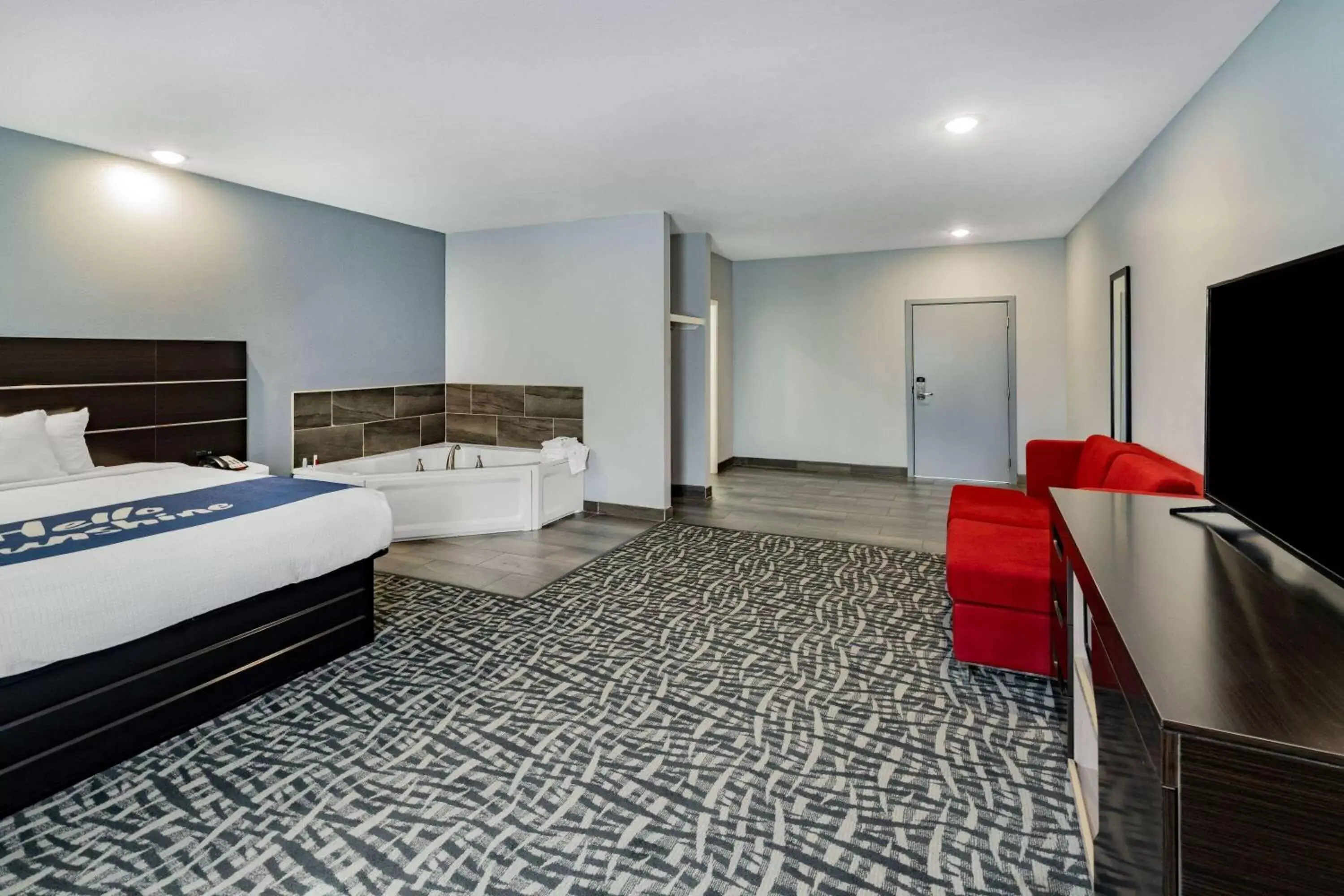 Photo of the whole room in Days Inn & Suites by Wyndham Horn Lake - Memphis Graceland