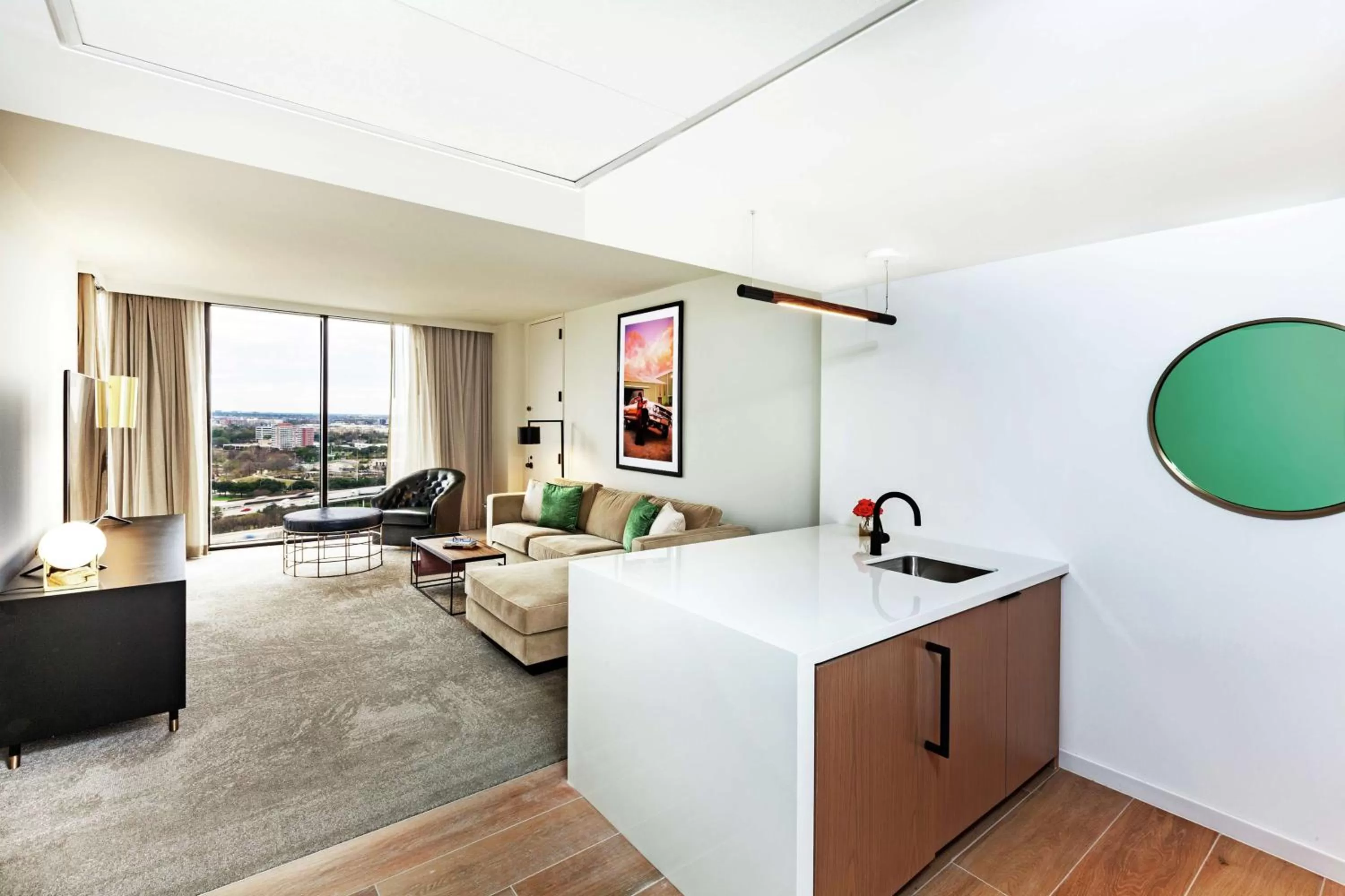 Living room in C. Baldwin, Curio Collection by Hilton