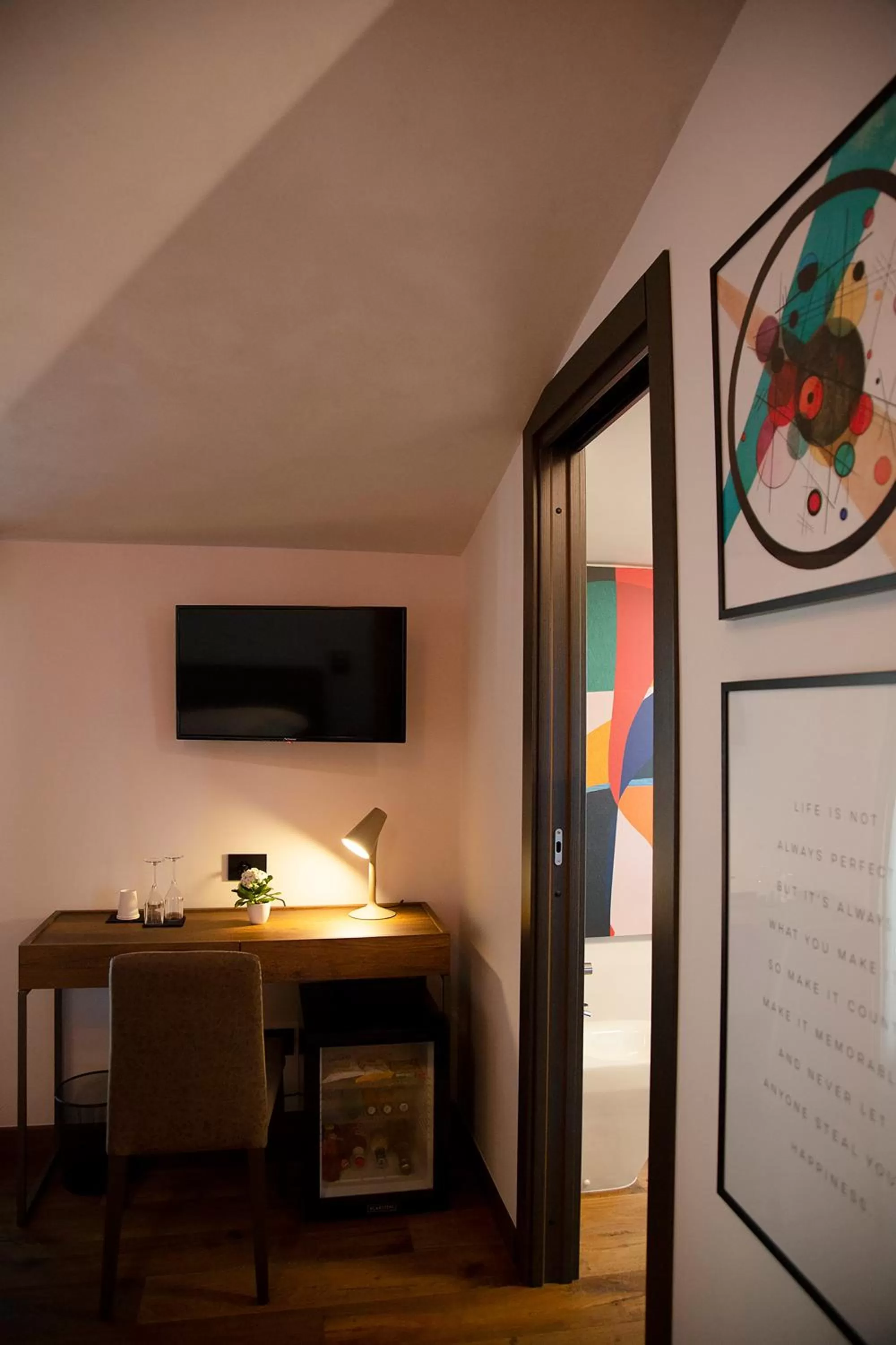 TV and multimedia, TV/Entertainment Center in MANTRA Suite&Rooms