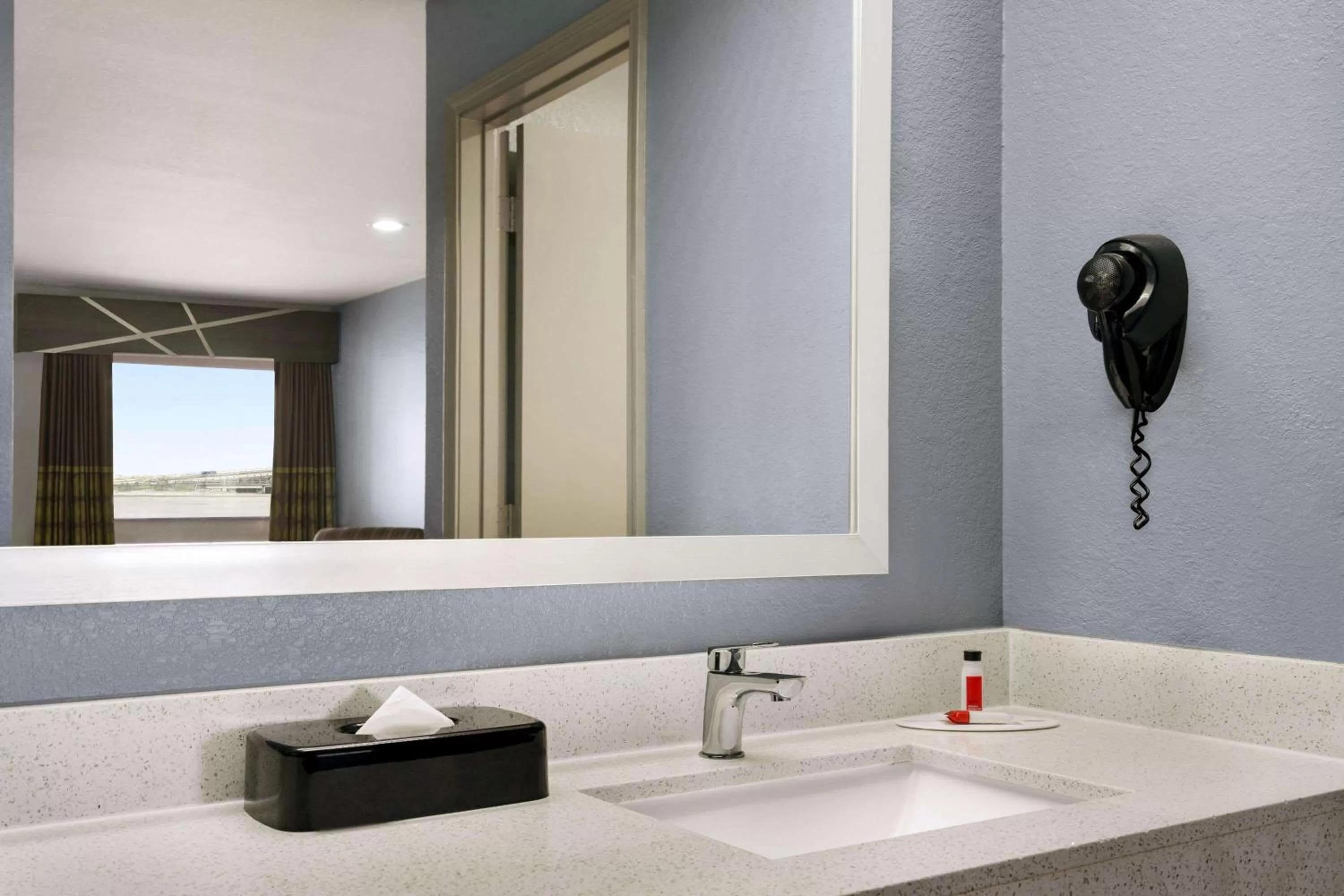 Bathroom in Super 8 by Wyndham Houston/Dtwn/I-610