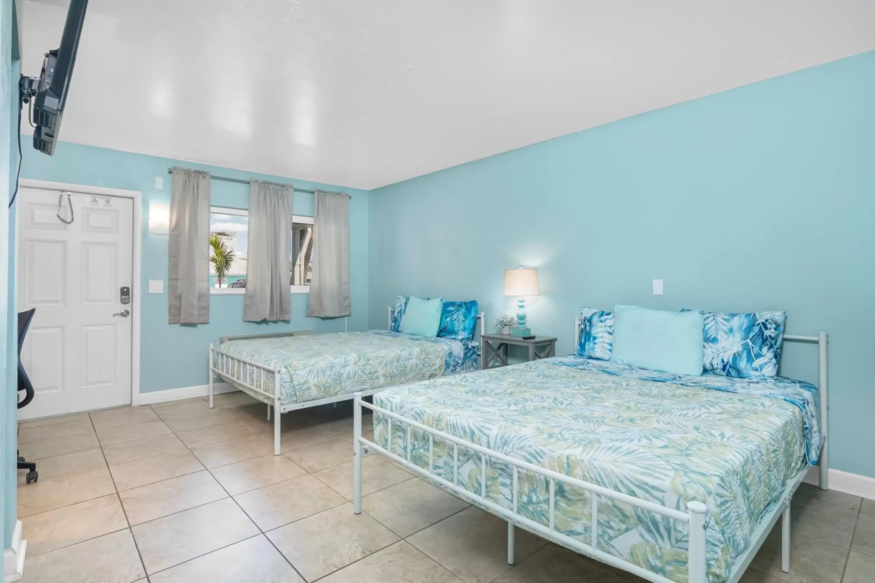 Queen Room with Two Queen Beds in Latitude 26 Waterfront Resort and Marina Queen Room with Two Queen Beds in Latitude 26 Waterfront Resort and Marina