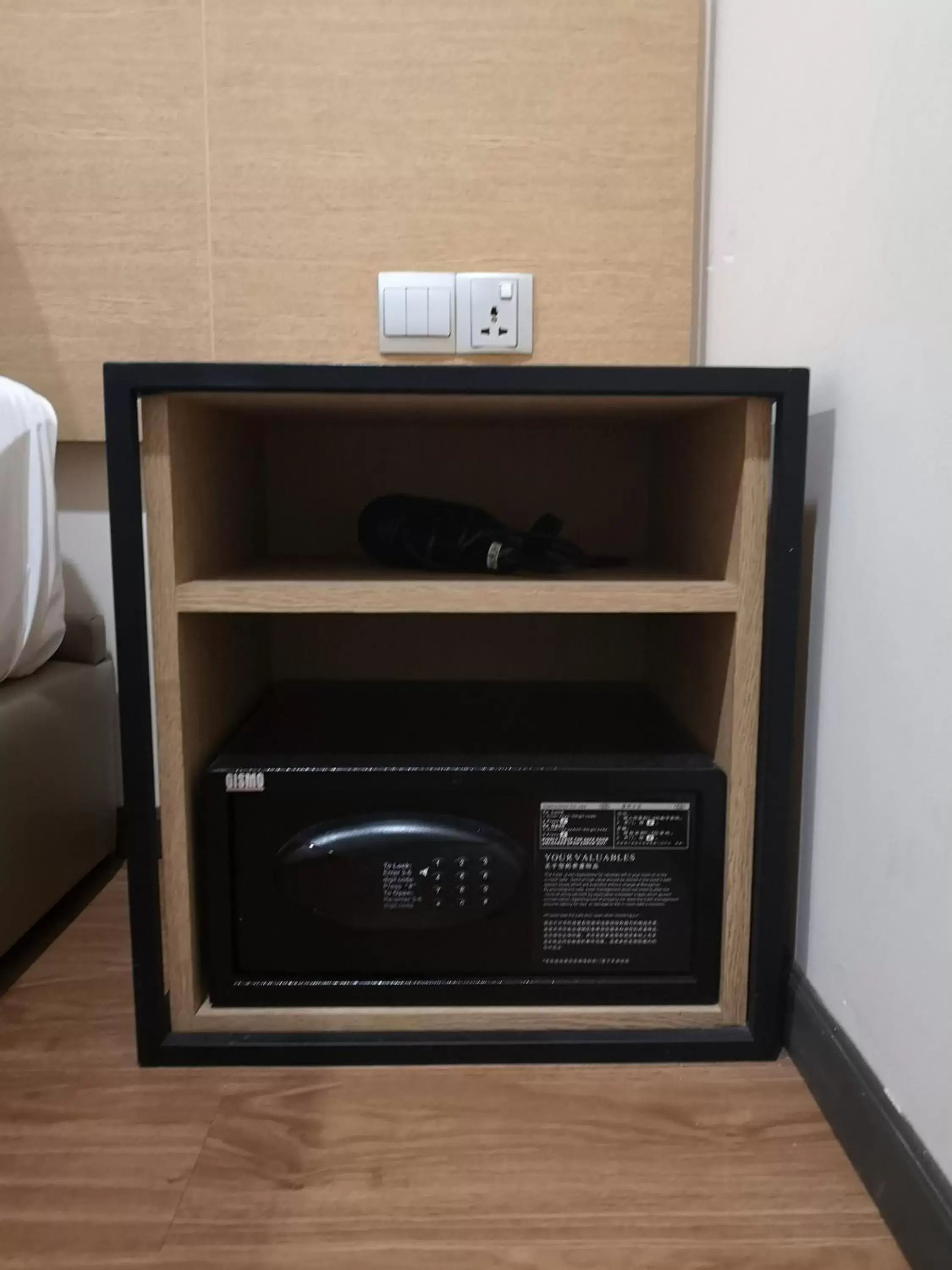 safe, TV/Entertainment Center in Qlio Hotel