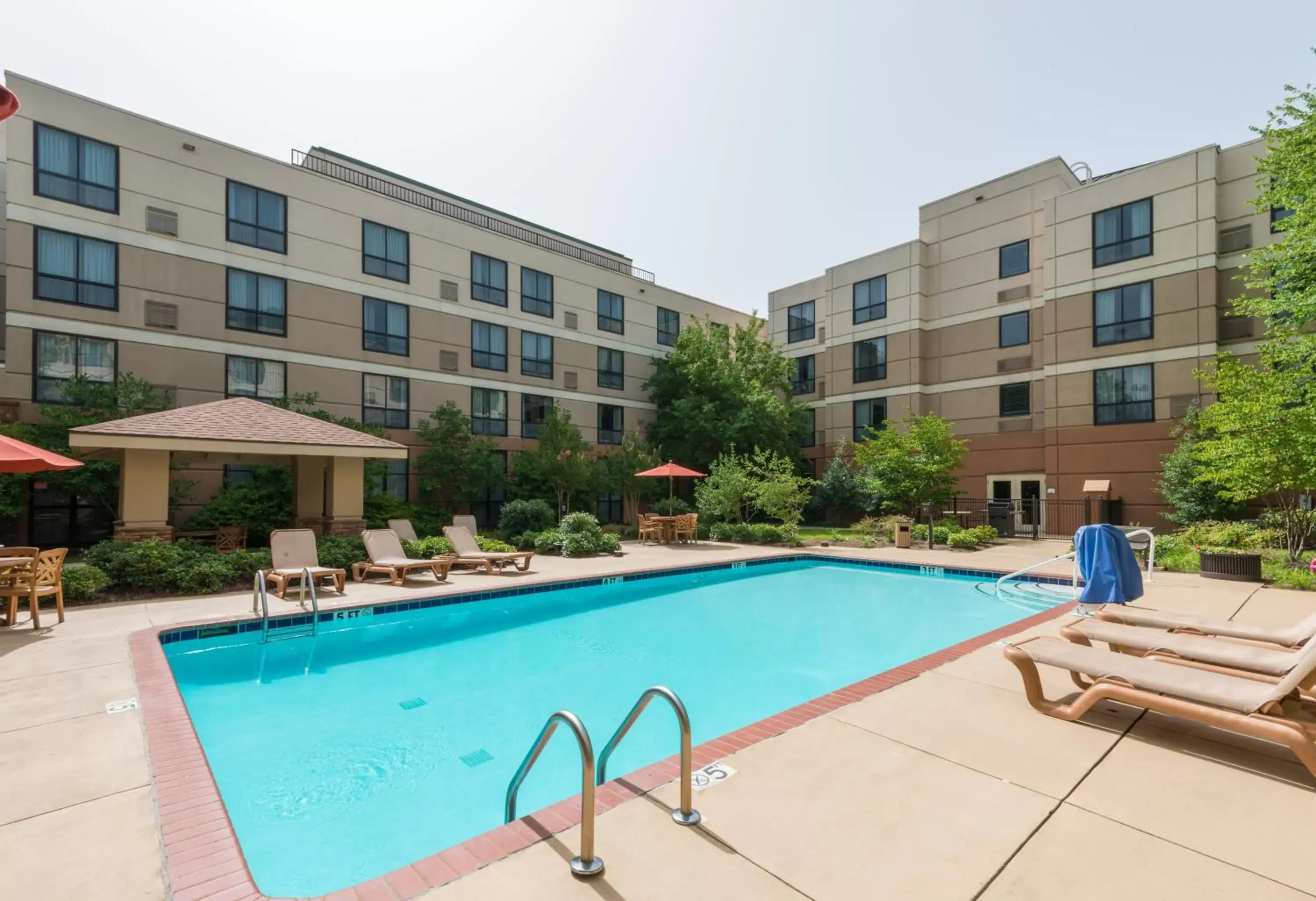 Swimming pool, Property Building in Staybridge Suites Memphis-Poplar Ave East, an IHG Hotel