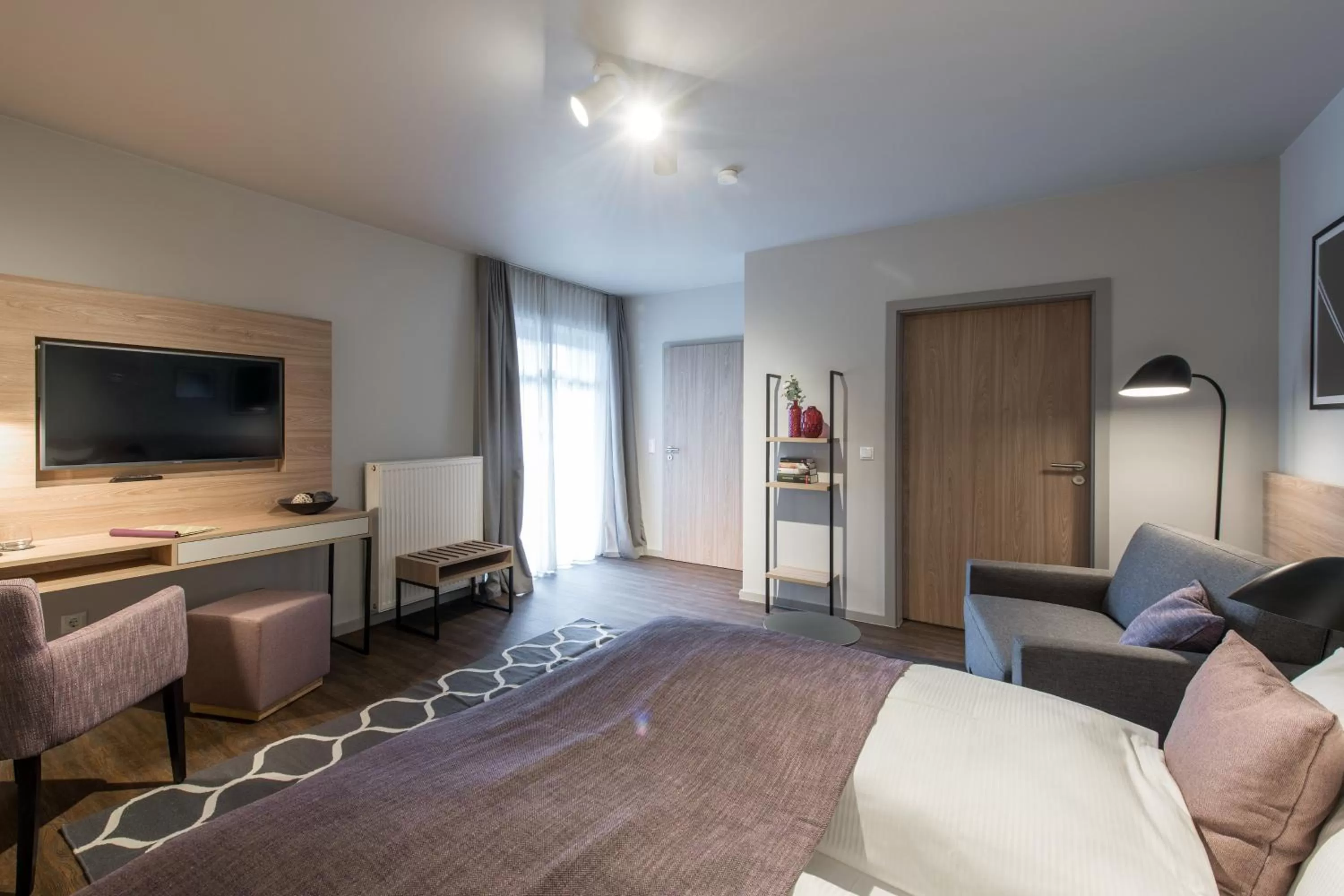 Photo of the whole room, Bed in stattHotel Weimar