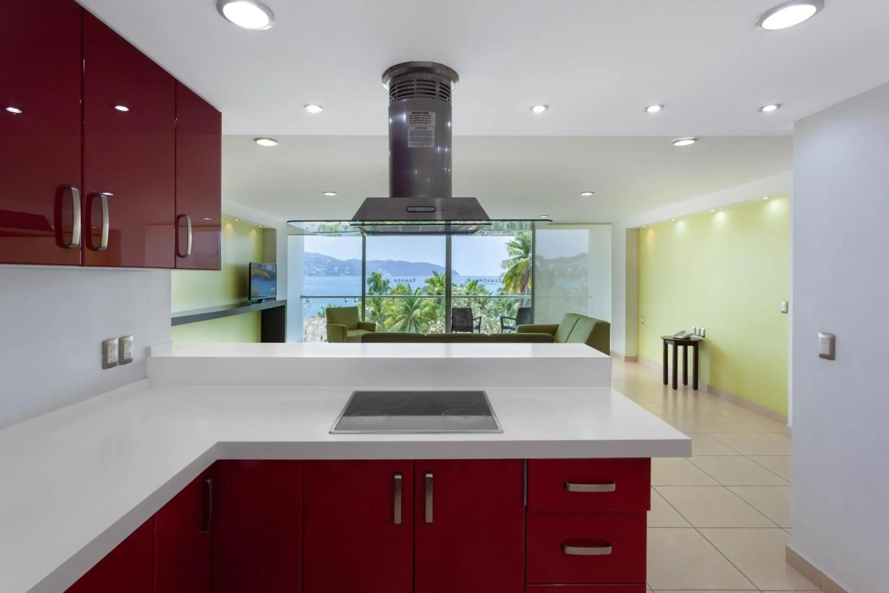 Kitchen or kitchenette, Kitchen/Kitchenette in Ramada by Wyndham Acapulco Hotel & Suites