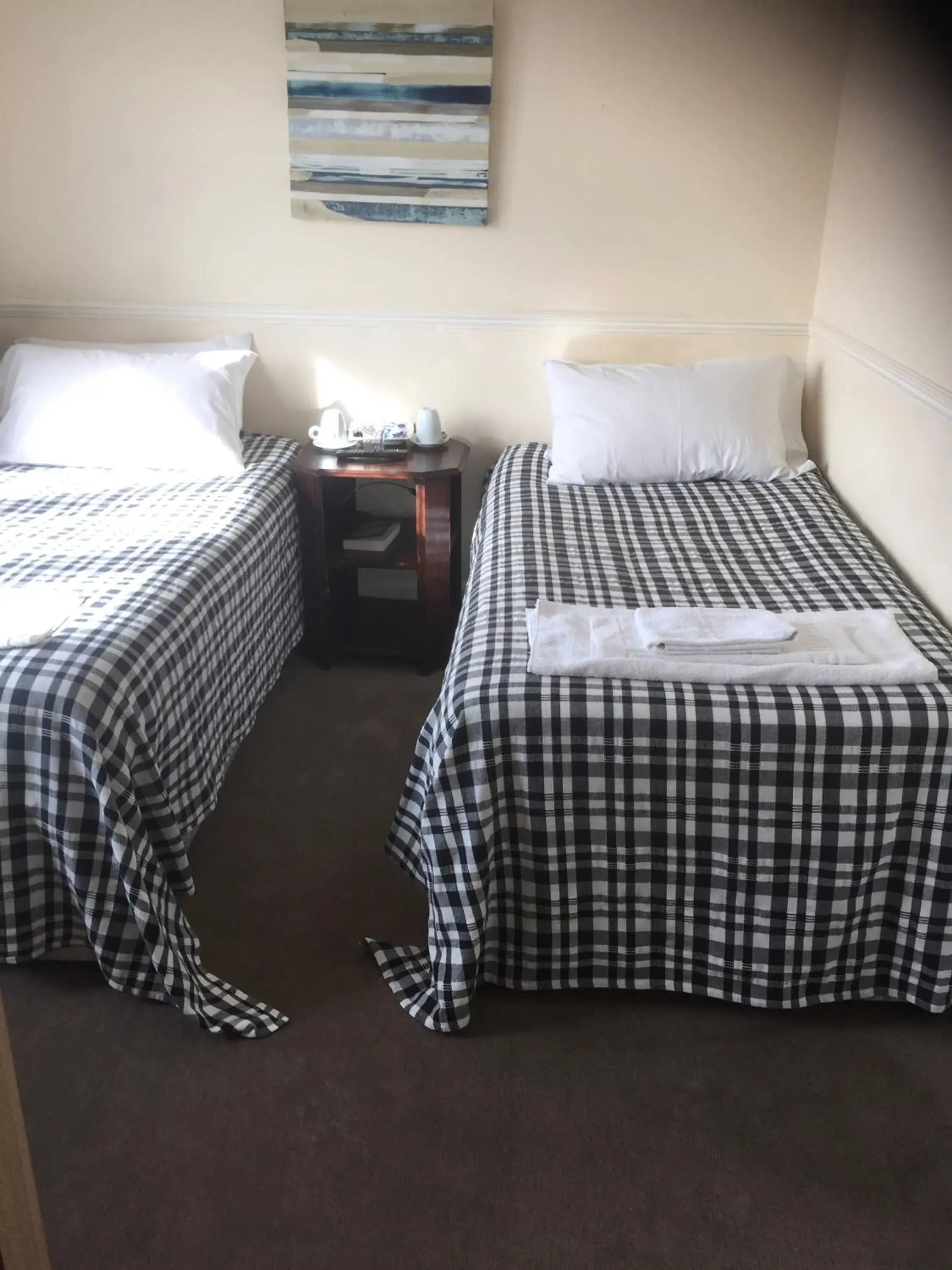 Bed in Colnbrook Lodge Guest House