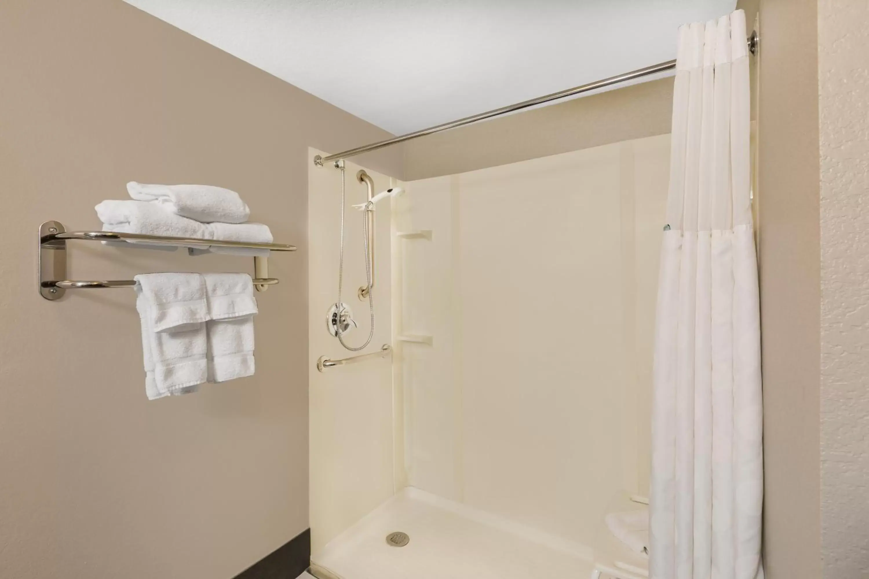 Bathroom in Ramada by Wyndham Des Moines Airport