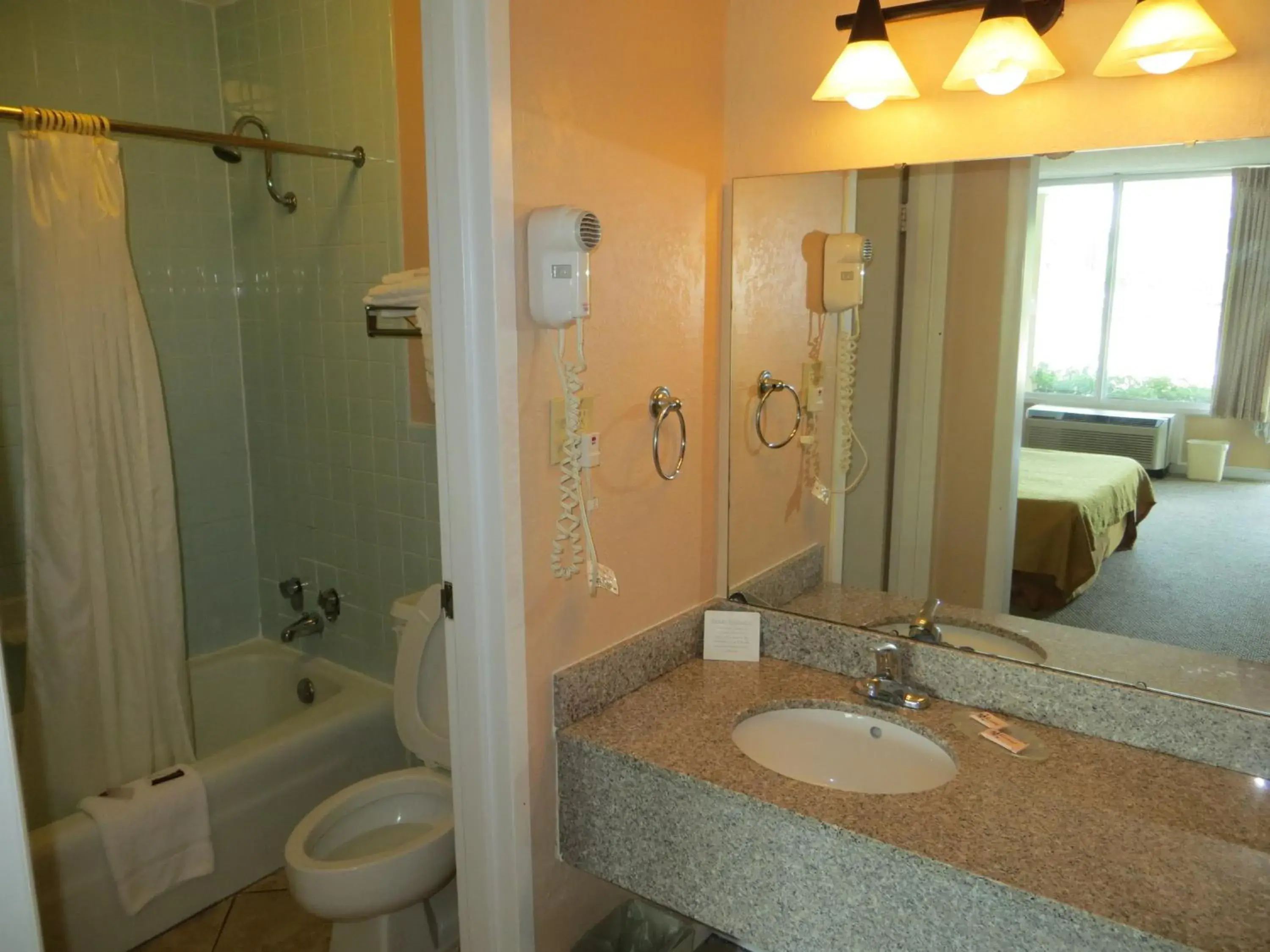 Toilet, Bathroom in Americourt Extended Stays