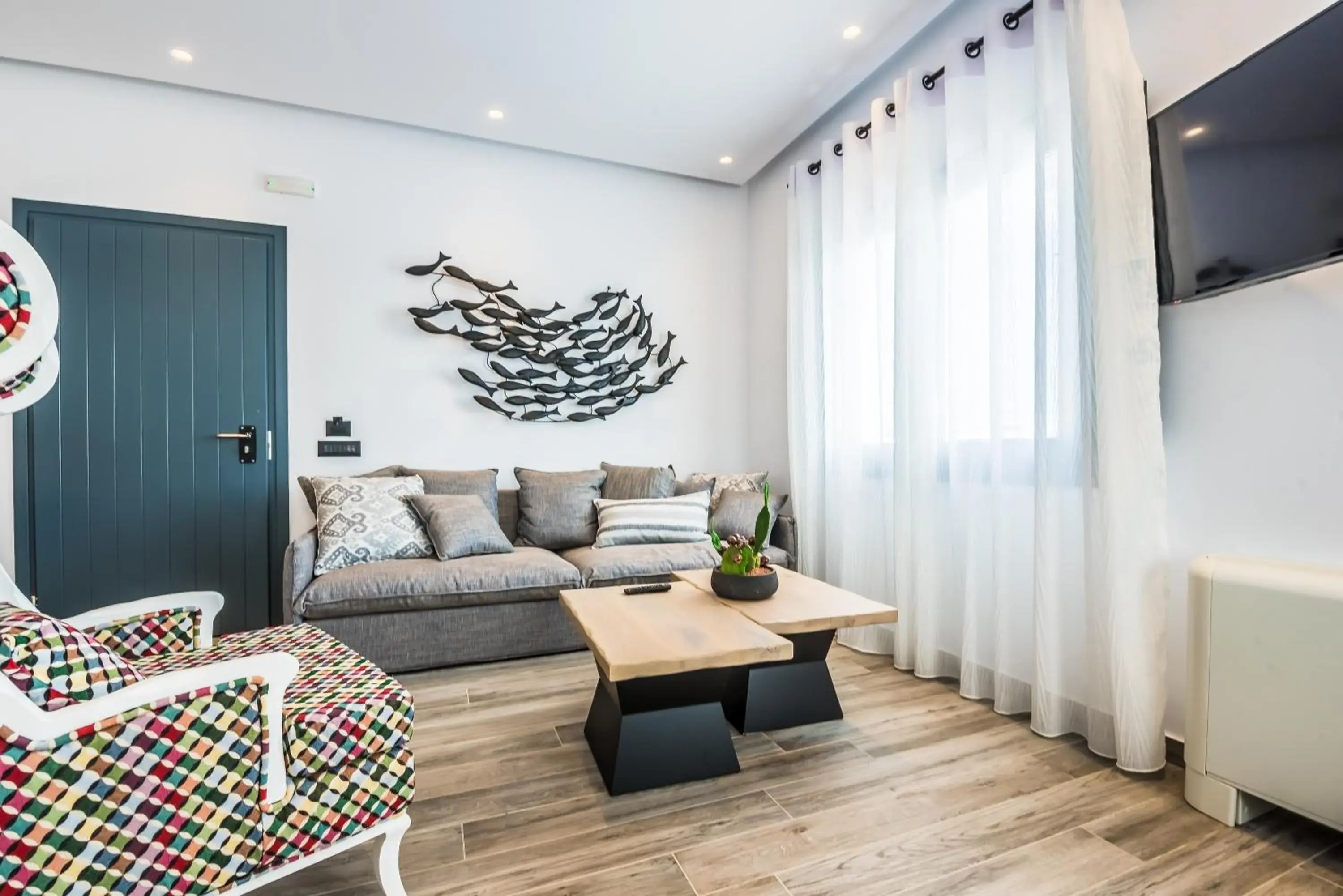 TV and multimedia, Seating Area in Portes Suites & Villas Mykonos