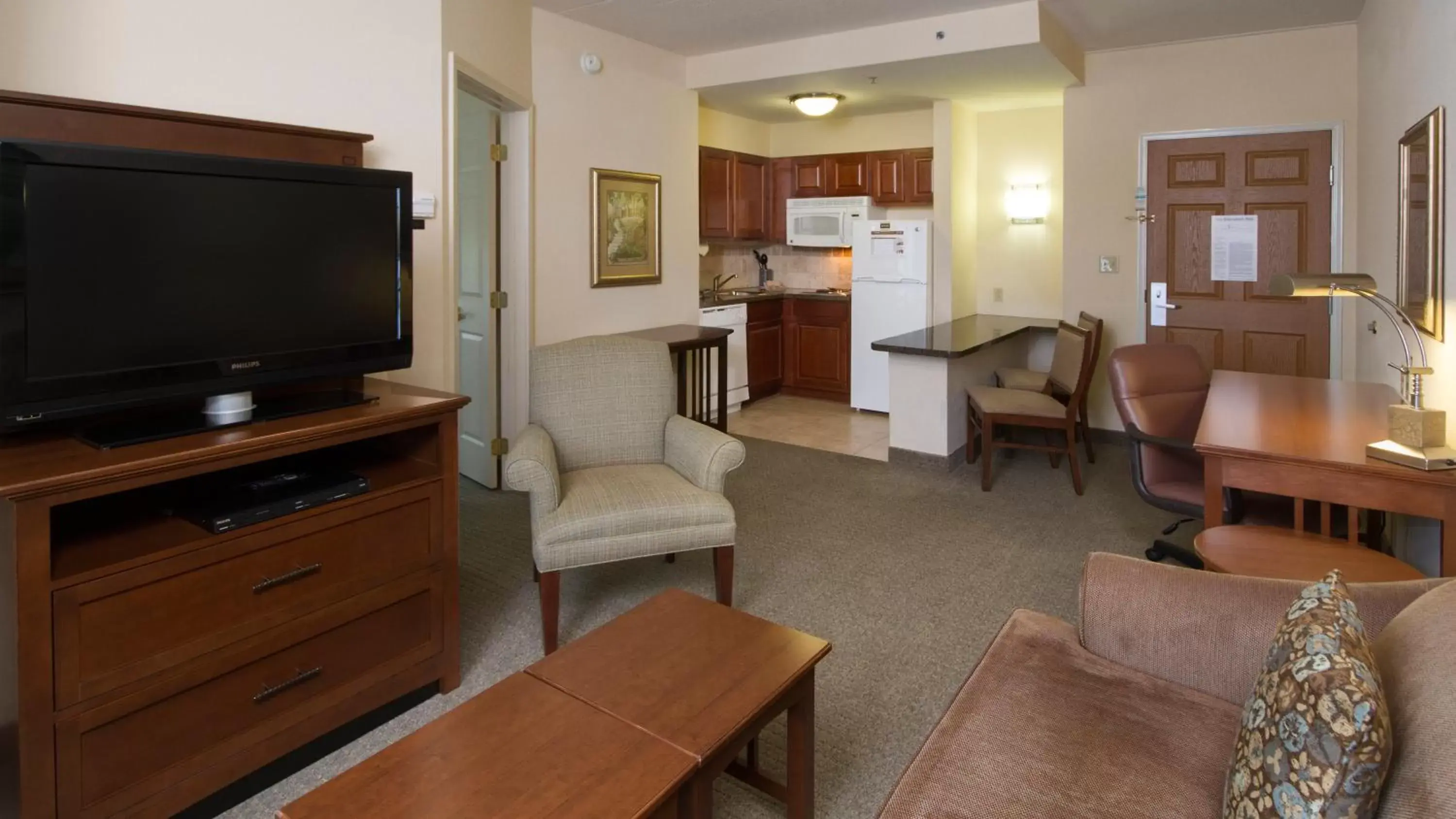 Photo of the whole room, TV/Entertainment Center in Staybridge Suites Buffalo, an IHG Hotel