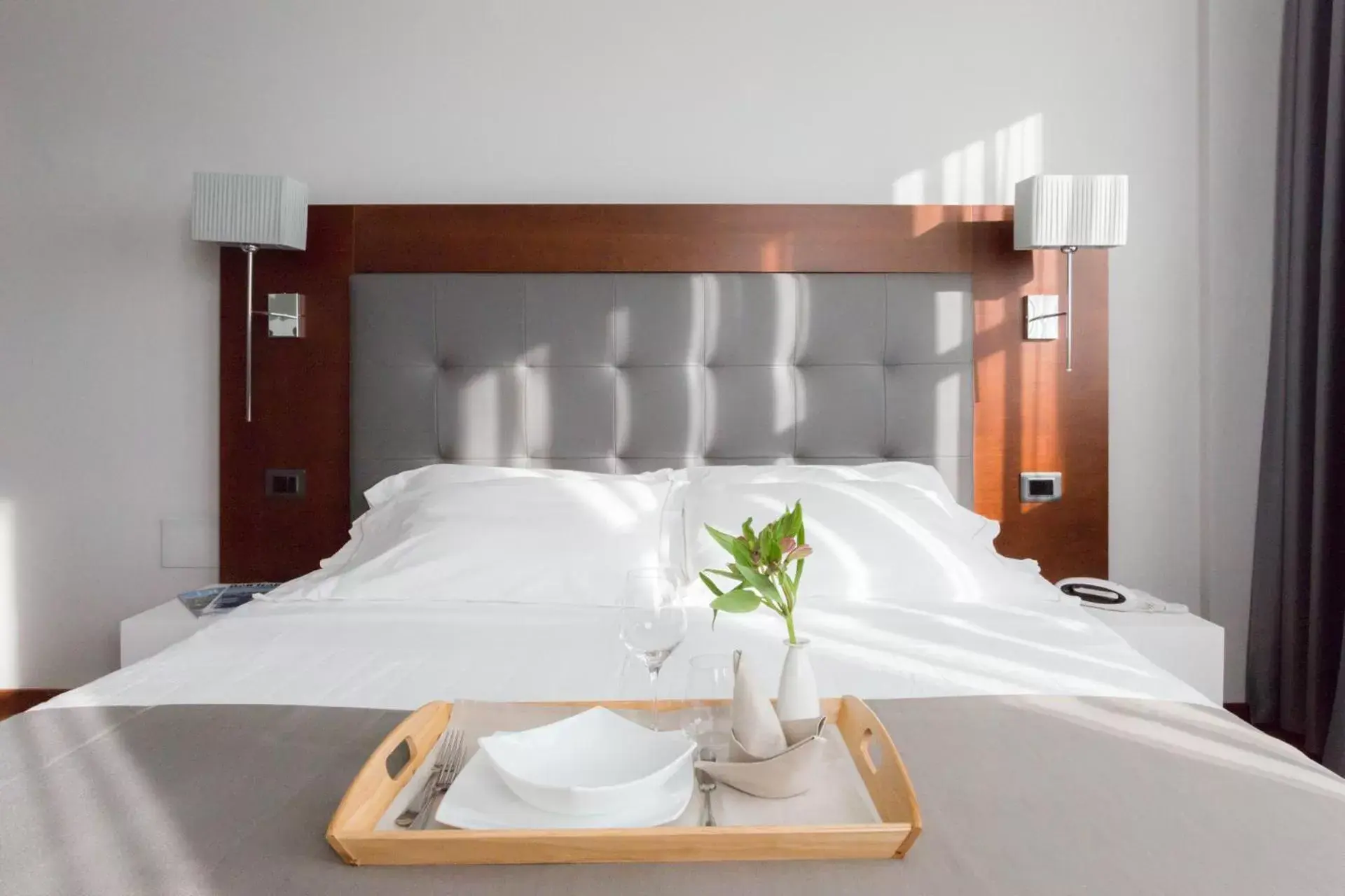 Bed in Raffaello Hotel