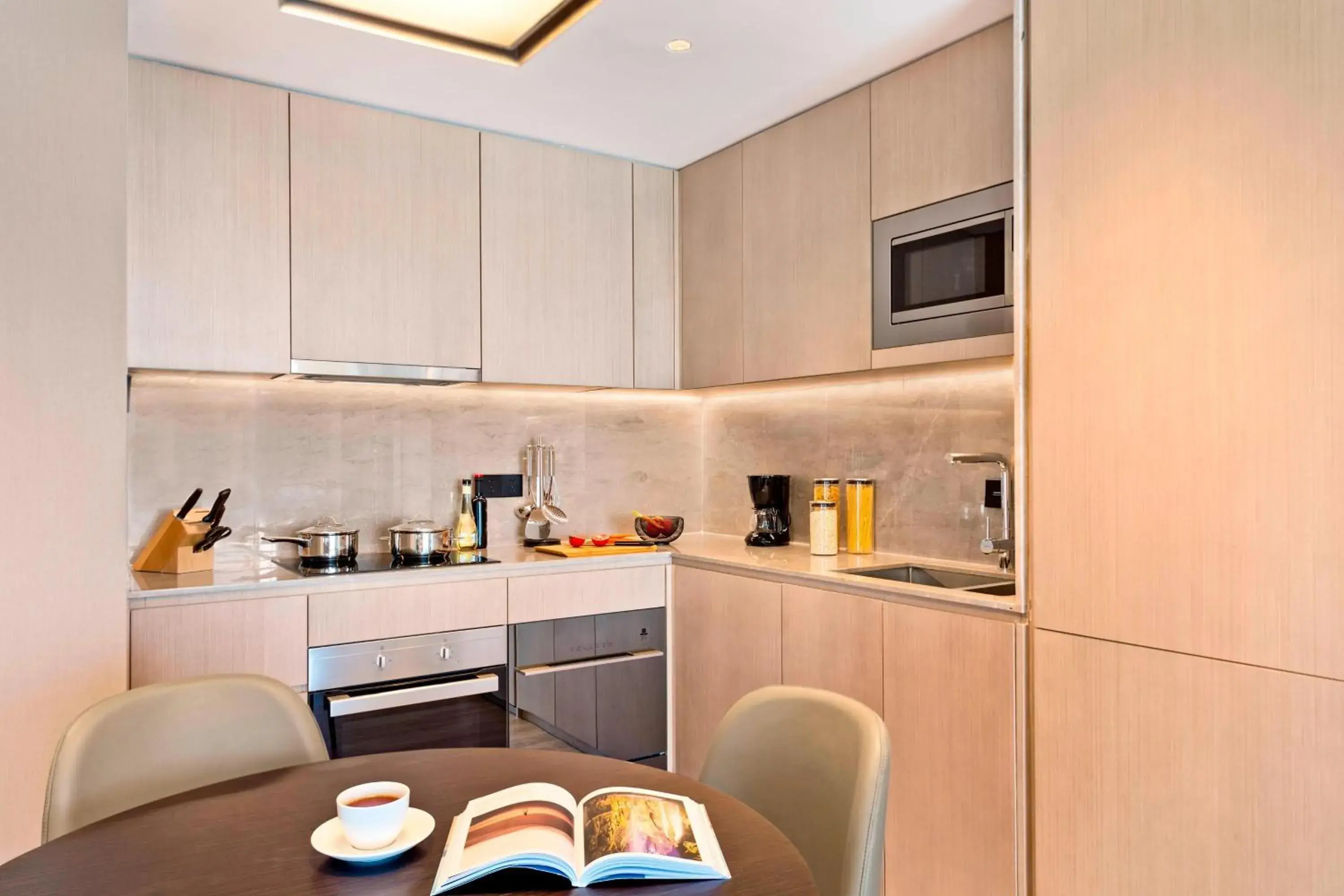 Bedroom, Kitchen/Kitchenette in Marriott Executive Apartments Hangzhou Yuhang