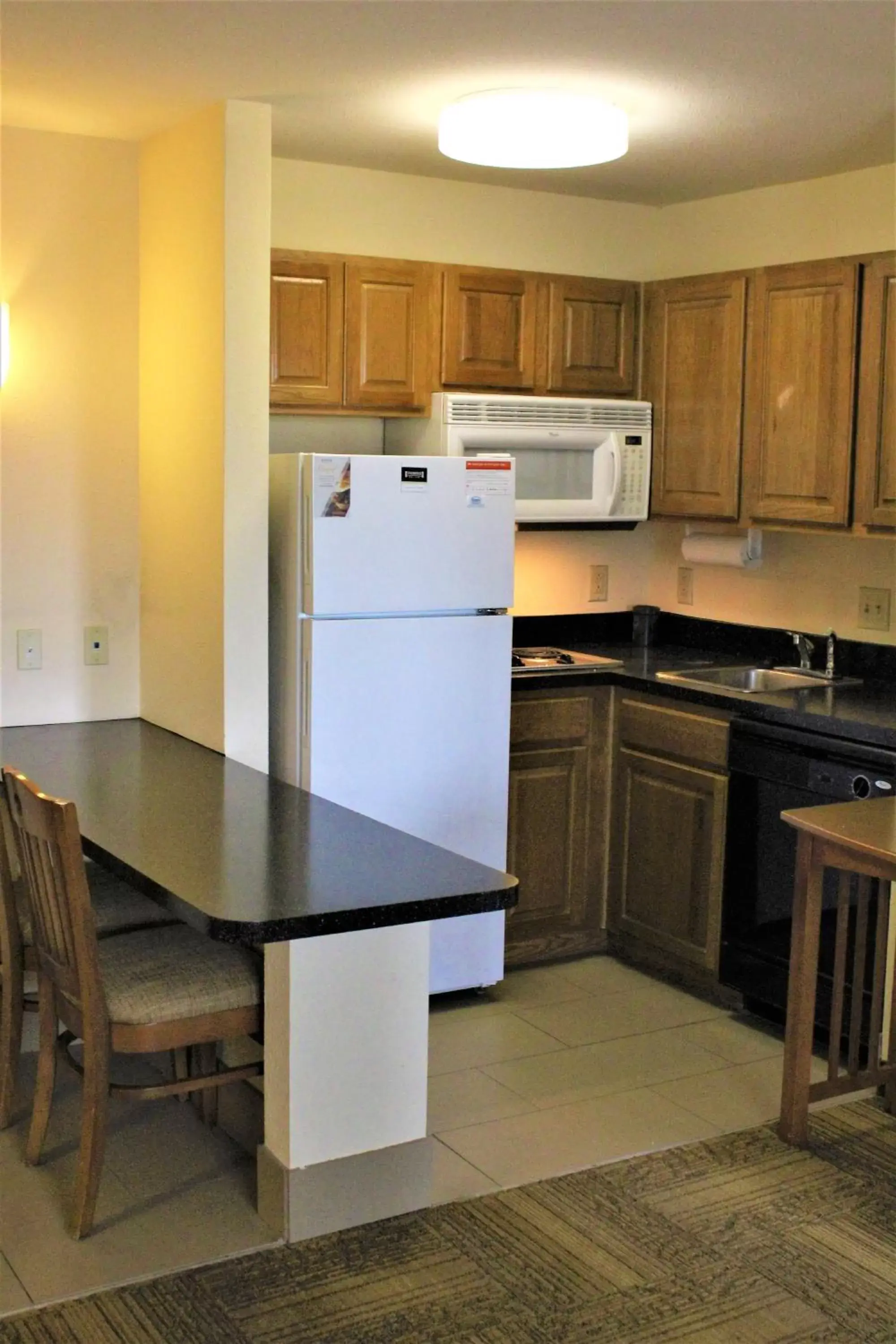 Photo of the whole room, Kitchen/Kitchenette in Staybridge Suites Houston - Willowbrook, an IHG Hotel
