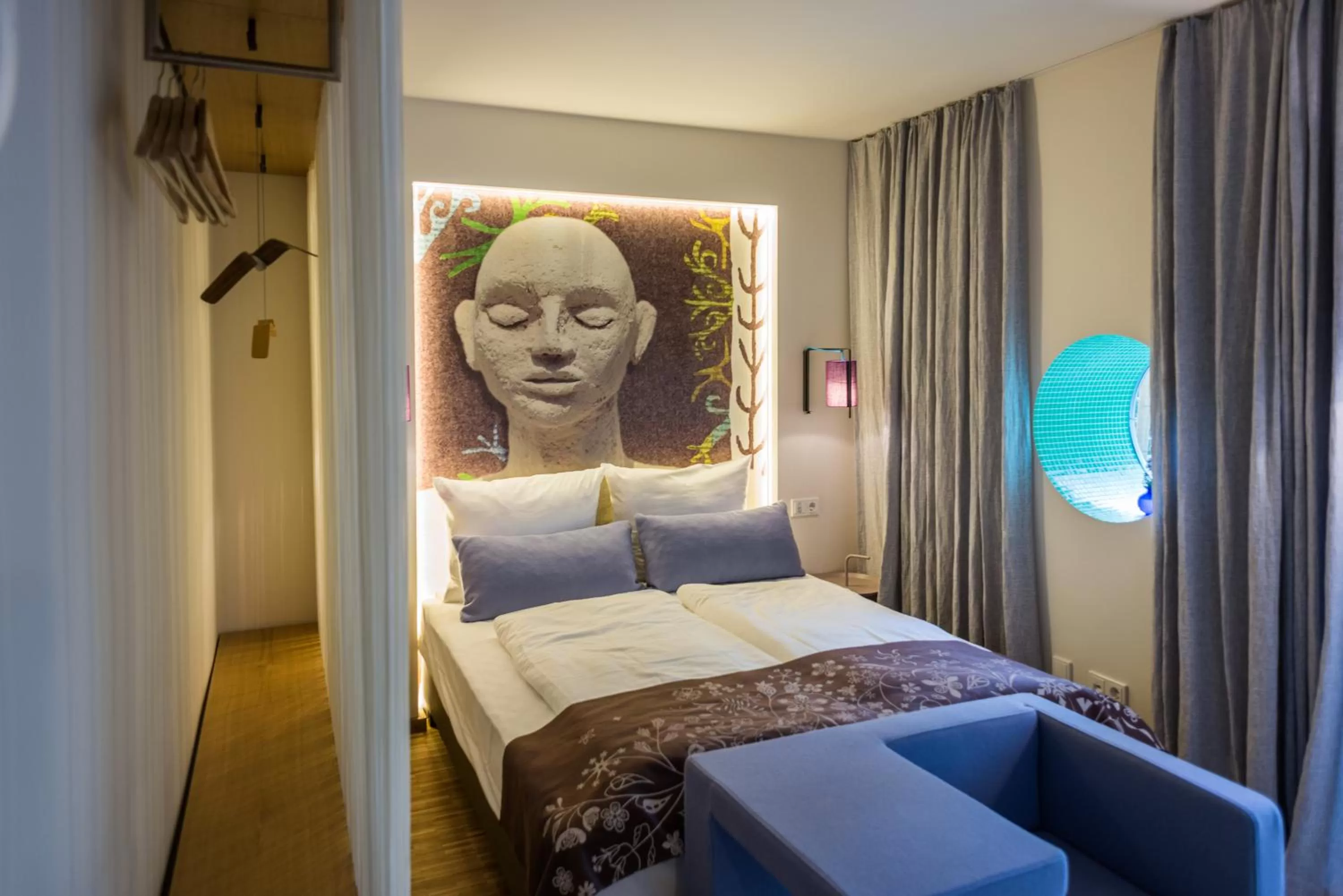 Seating area, Bed in Nala Individuellhotel