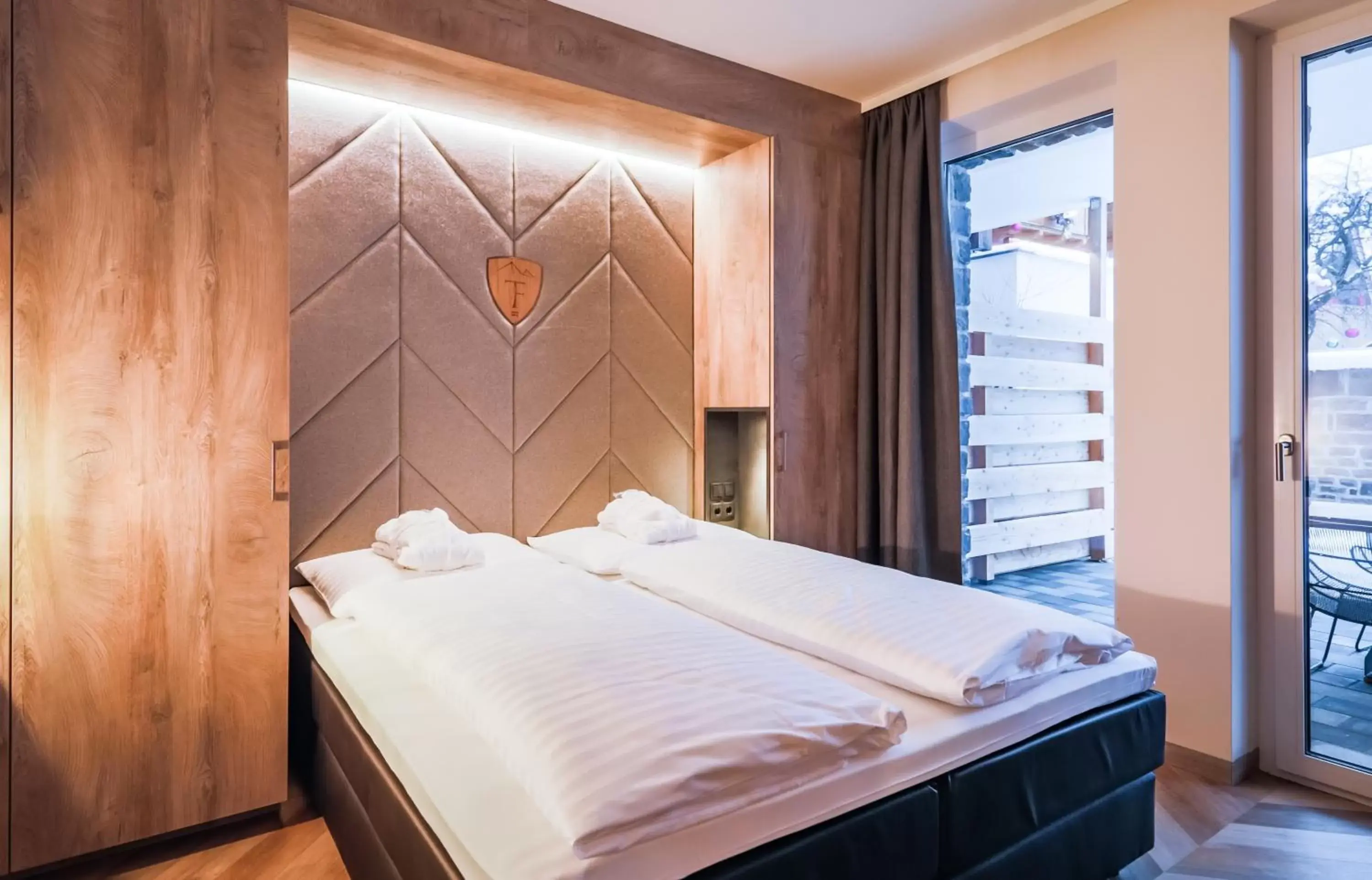 Bedroom, Bed in 24 by AvenidA Hotel & Residences Kaprun