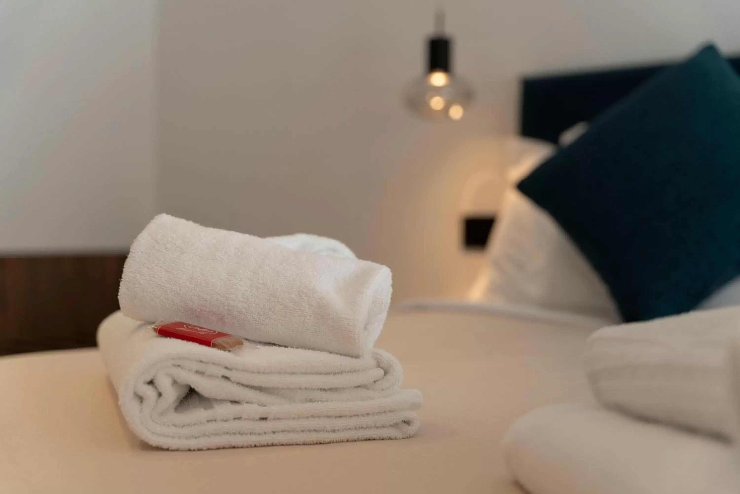 towels, Bed in B&B Le Suites di Costanza