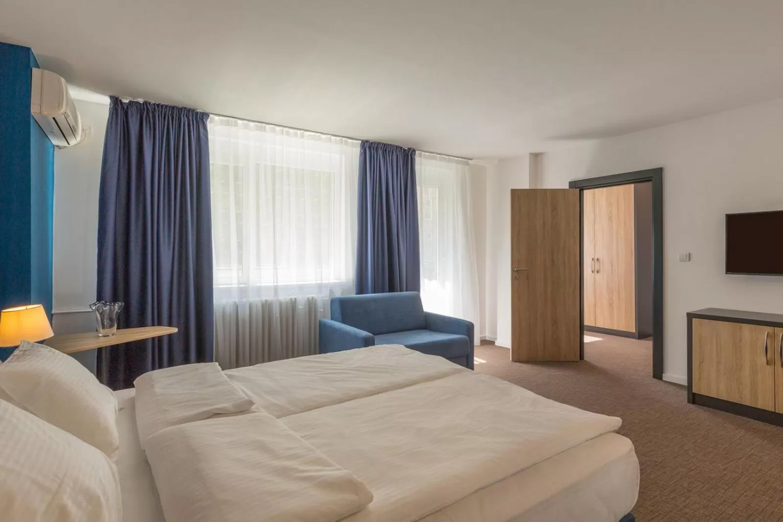 Photo of the whole room, Bed in Premium Crown Suites