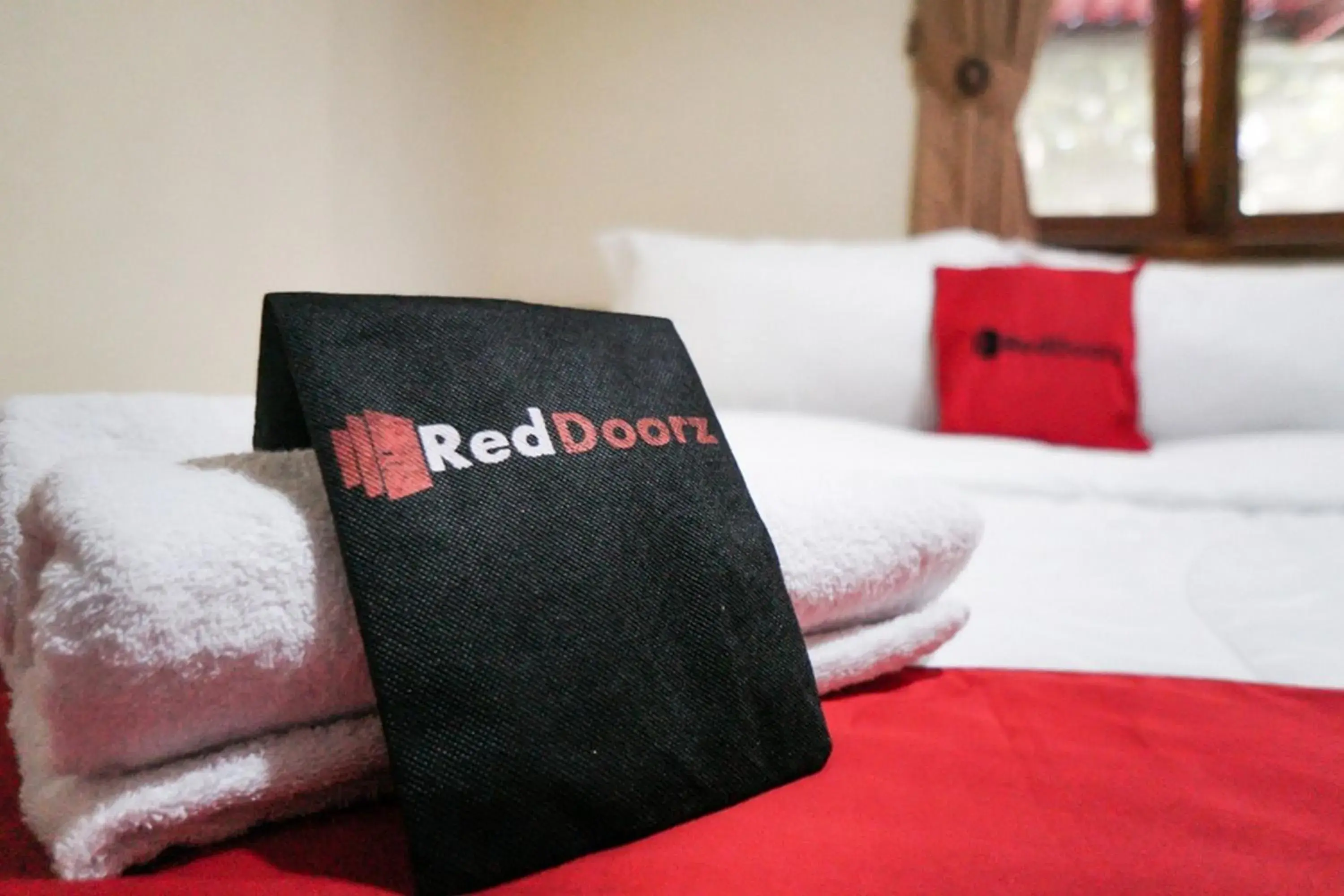 Bed in RedDoorz Syariah near Exit Tol Malang