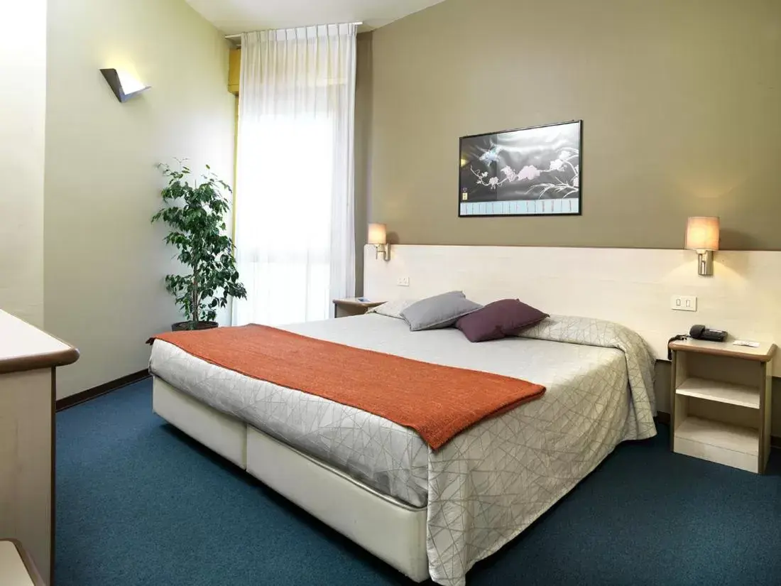 Bed in Hotel Ristorante Alcide