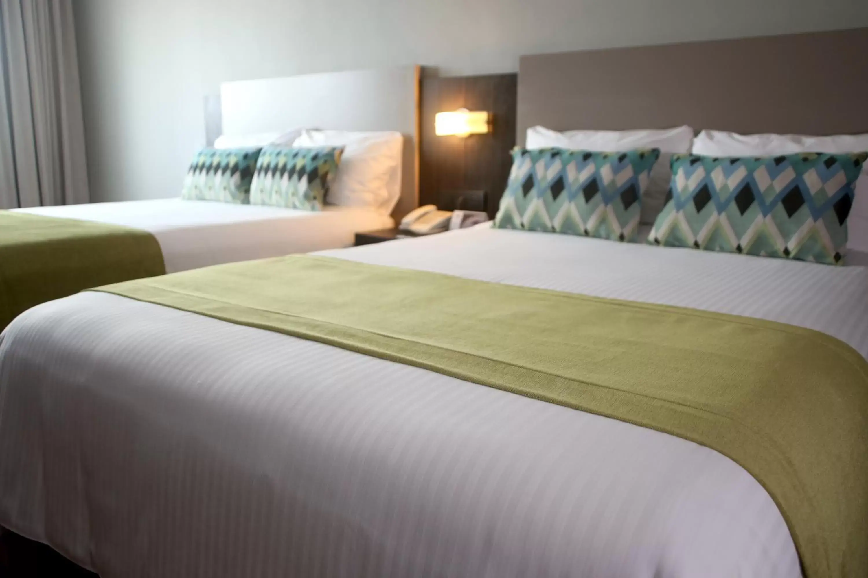 Bed in Aranjuez Hotel & Suites