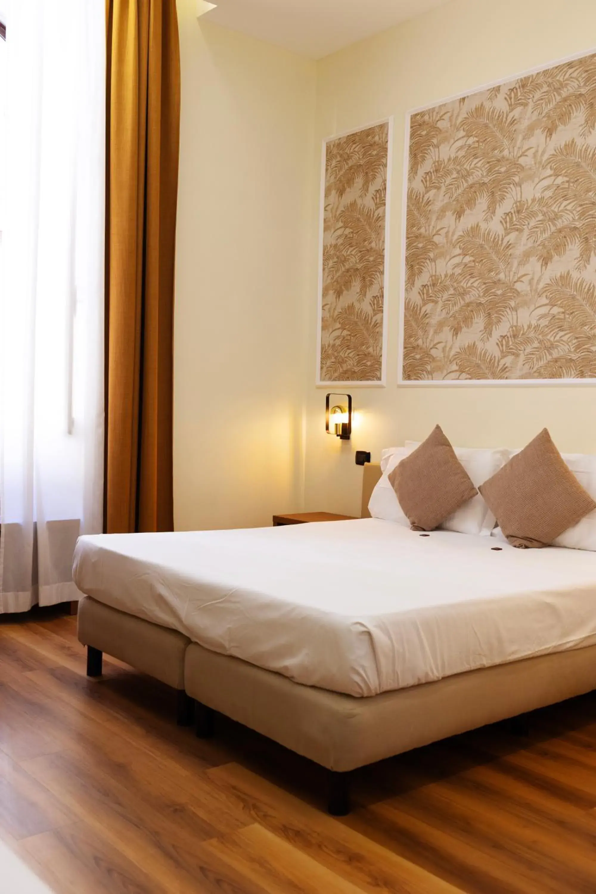 Bed in Hotel Giotto Flavia