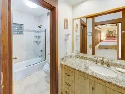 Bathroom in Kiahuna Plantation Resort Kauai by OUTRIGGER