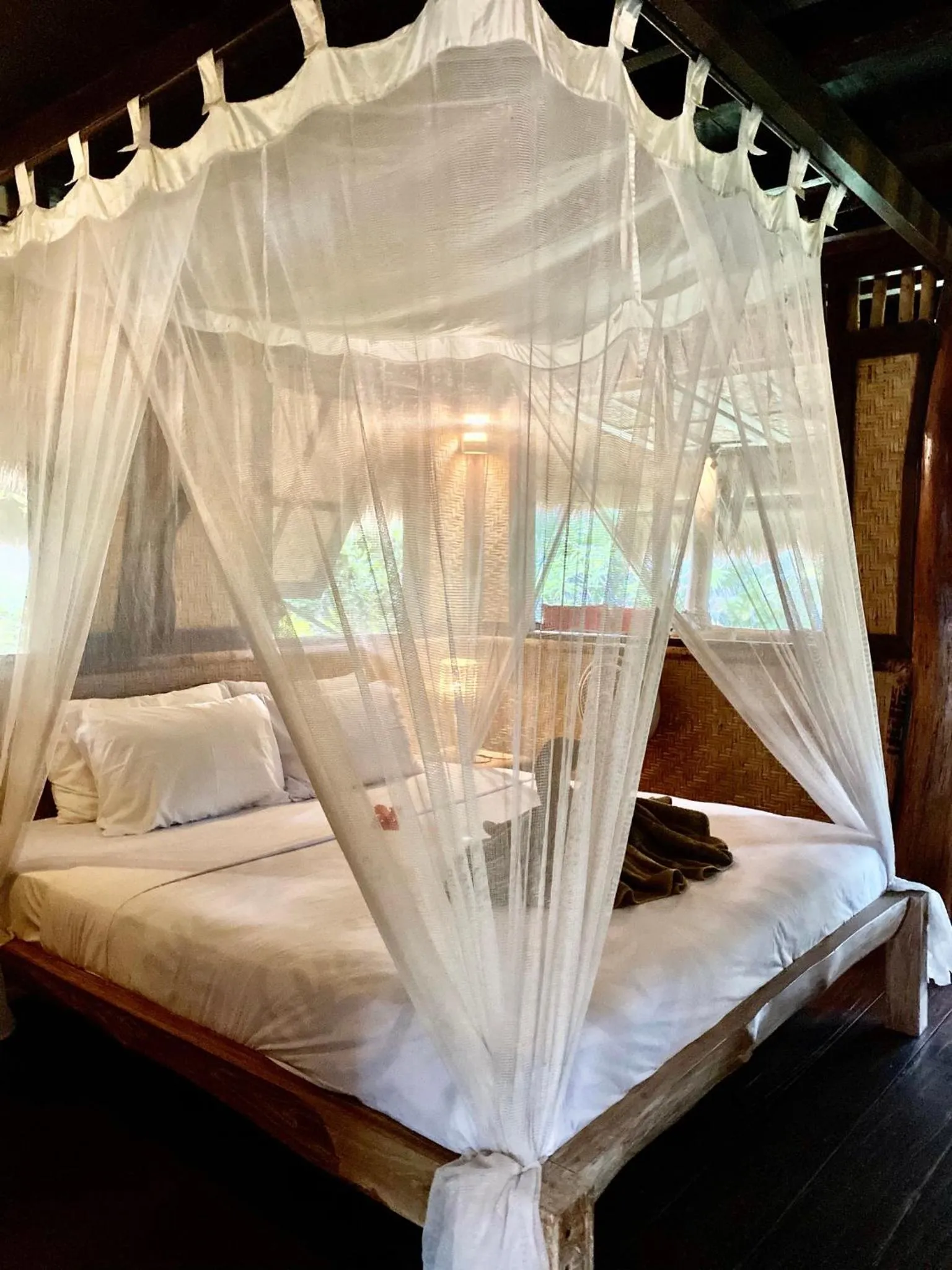 Bed in Flower Bud Bungalow Balangan