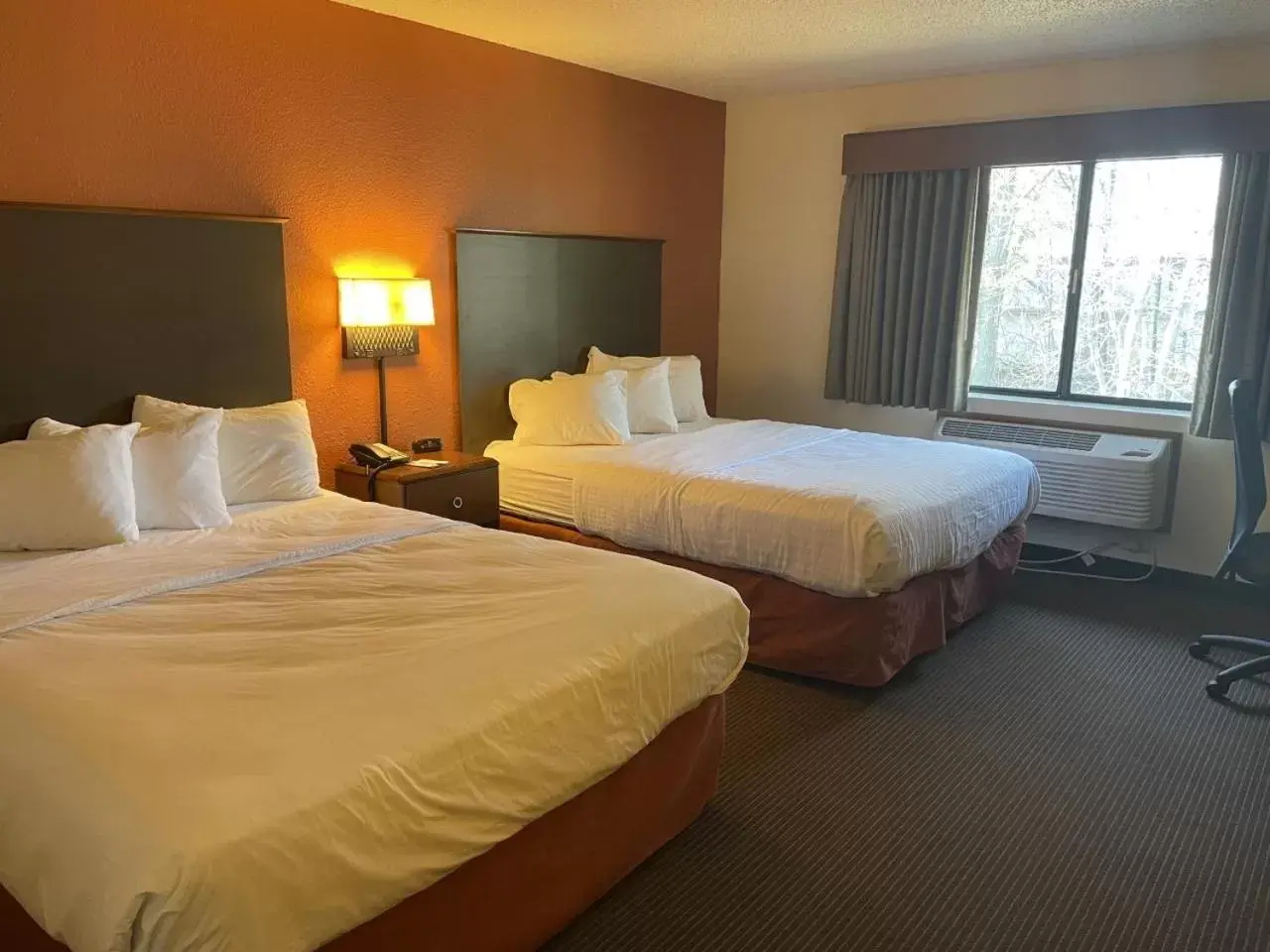 Queen Room with Two Queen Beds - Non-Smoking in AmericInn by Wyndham Minocqua