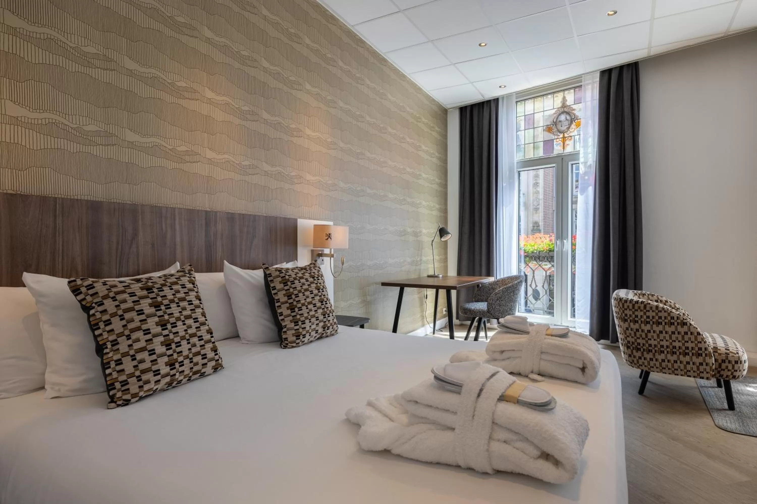 Bed in Hotel Amsterdam De Roode Leeuw