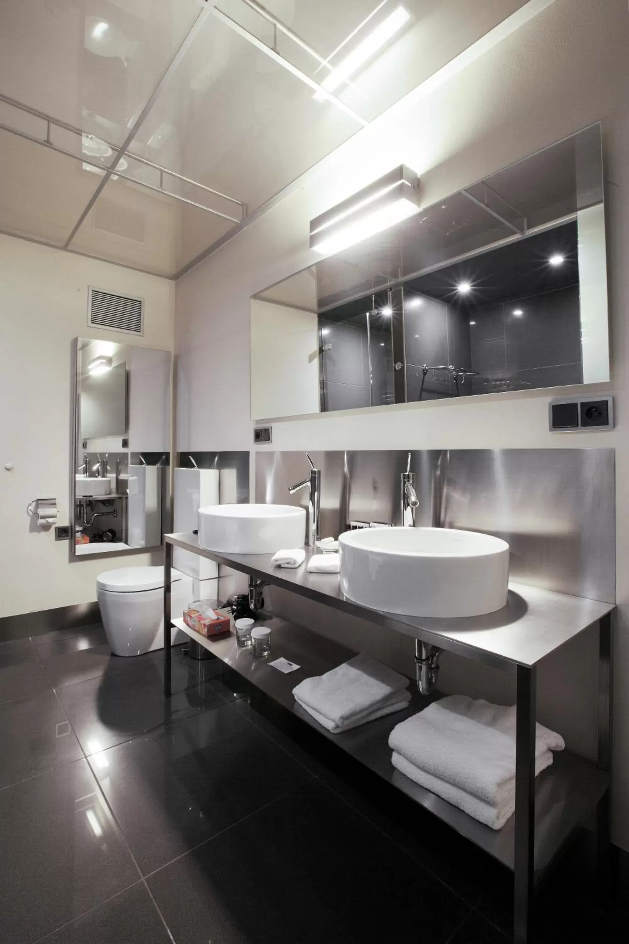 Bathroom in Old Town Square Residence by Emblem