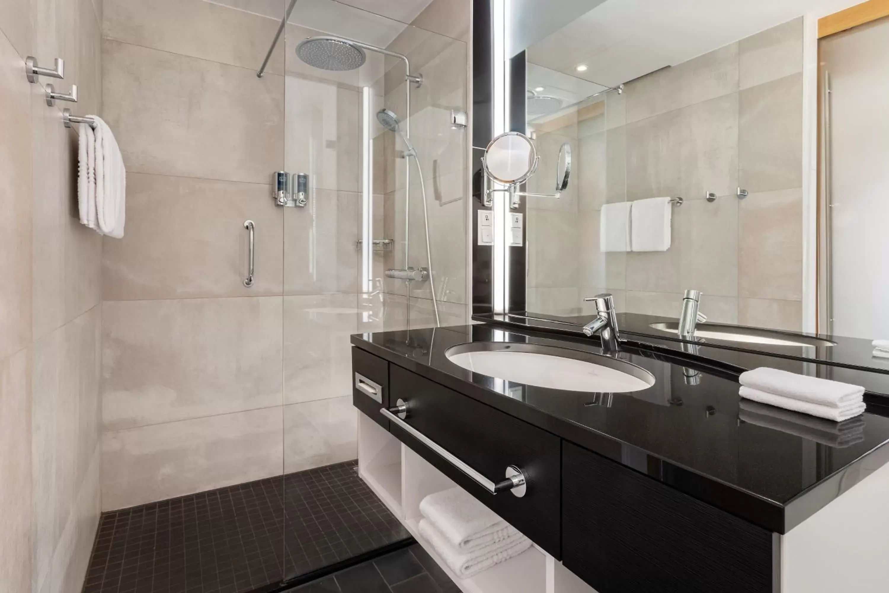 Bathroom in Four Points by Sheraton Panoramahaus Dornbirn