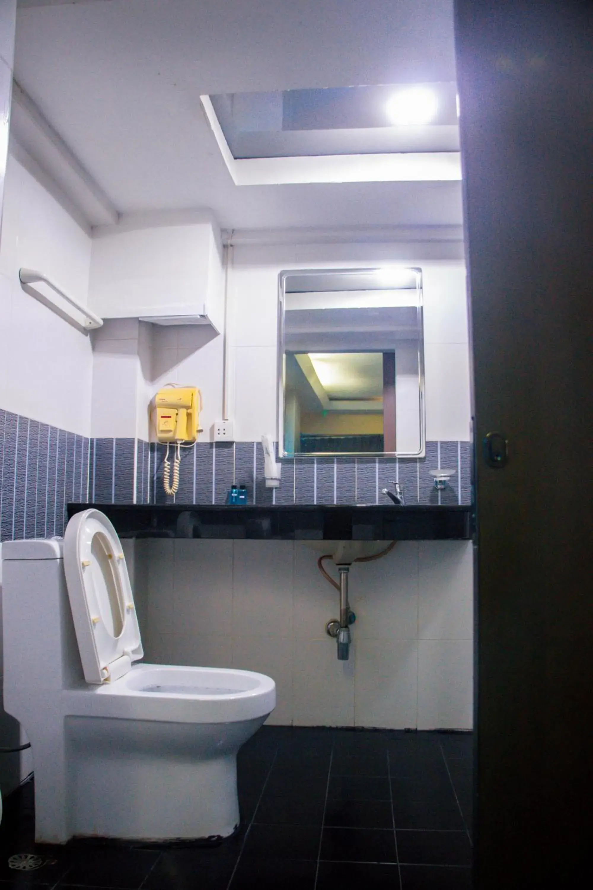 Bathroom in Visiting Card Hotel & Resort