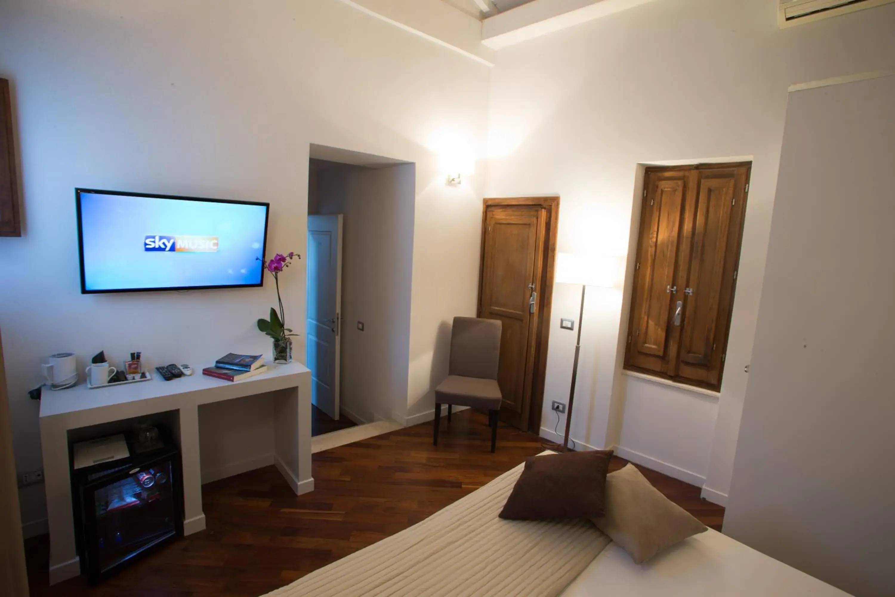 Bedroom, TV/Entertainment Center in Relais Arco Della Pace