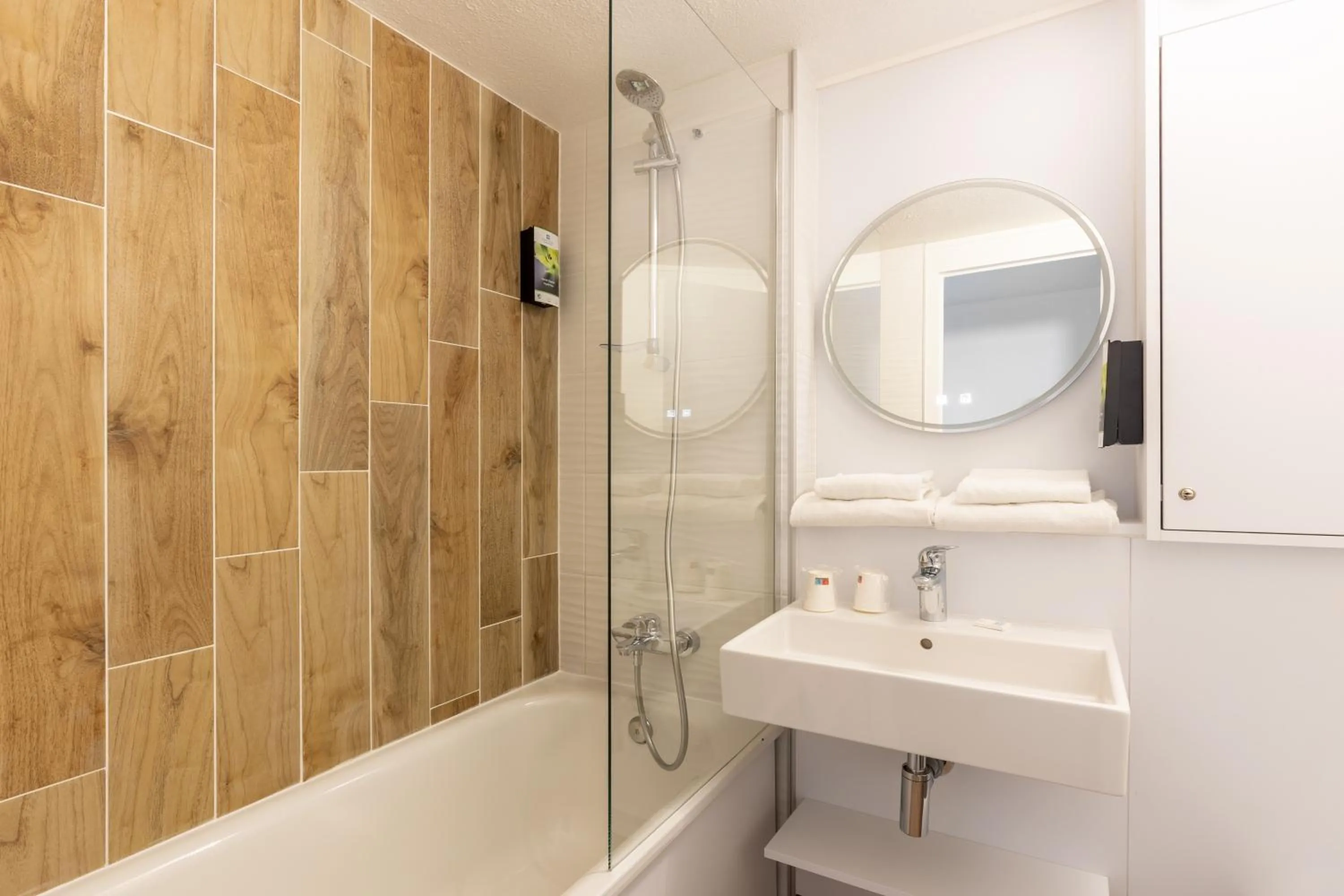 Bathroom in Sure Hotel by Best Western Plaisir