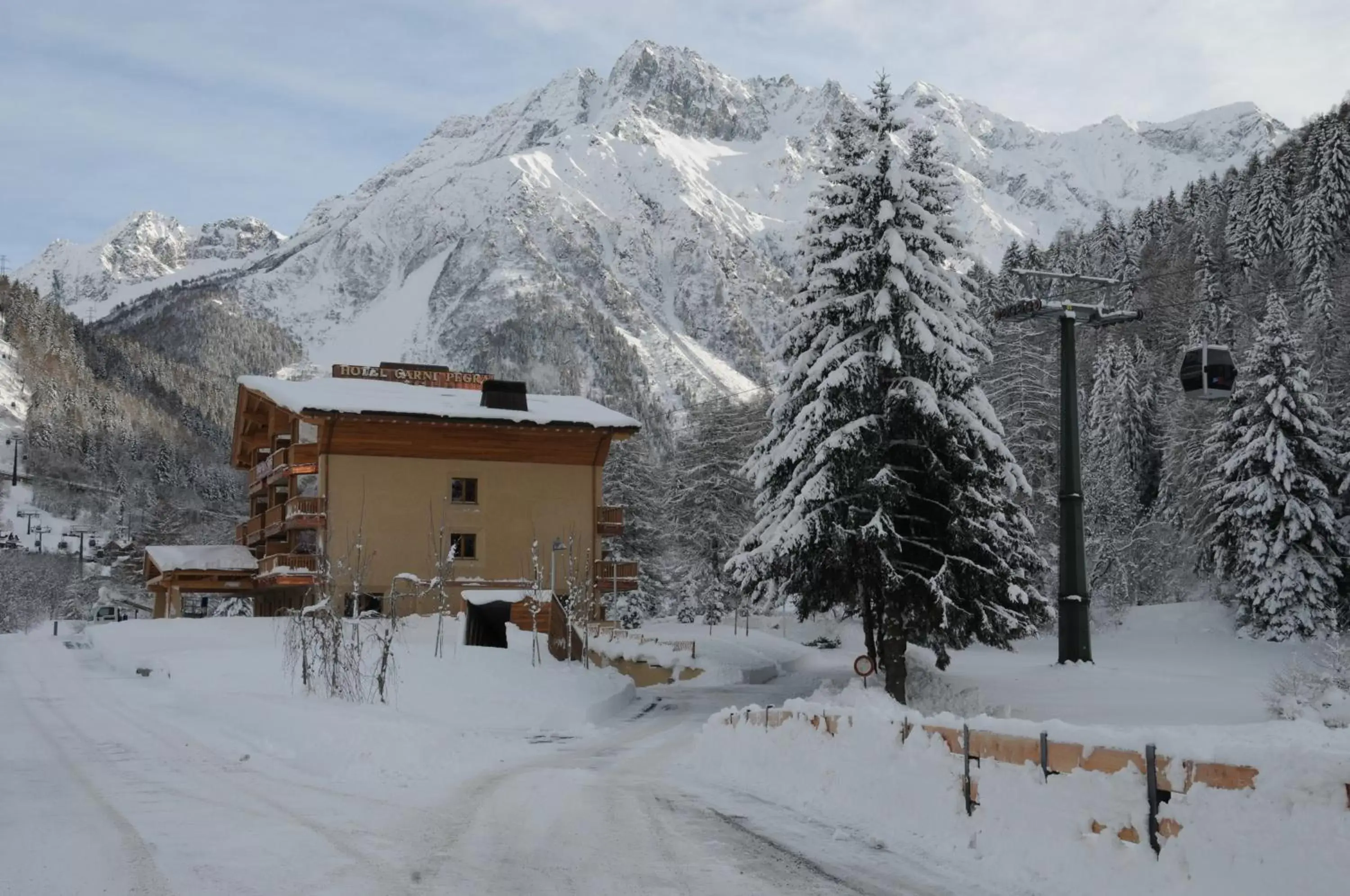 Property building, Winter in Hotel Garni Pegrà