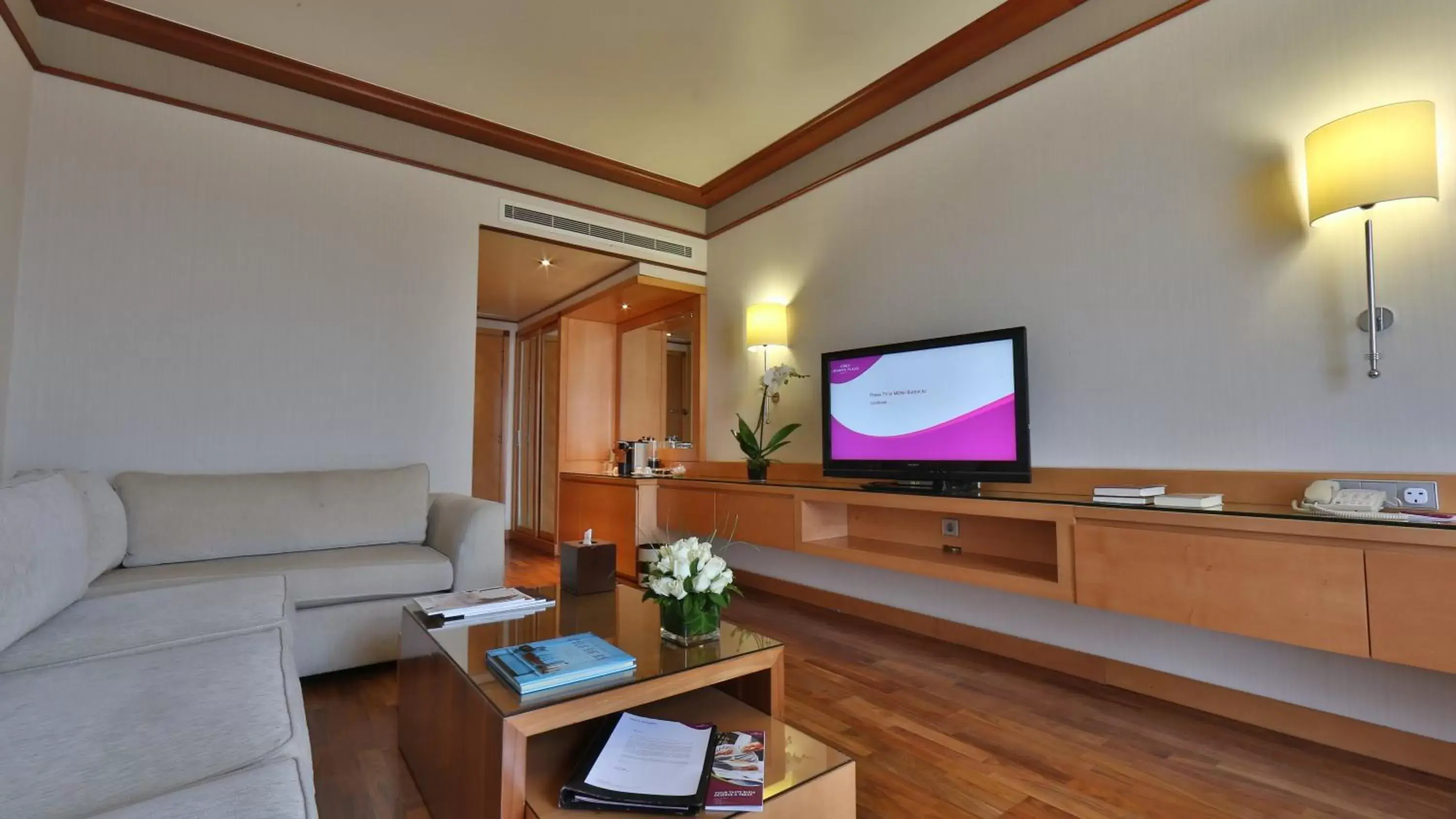 Photo of the whole room, TV/Entertainment Center in Crowne Plaza Hamra Beirut, an IHG Hotel