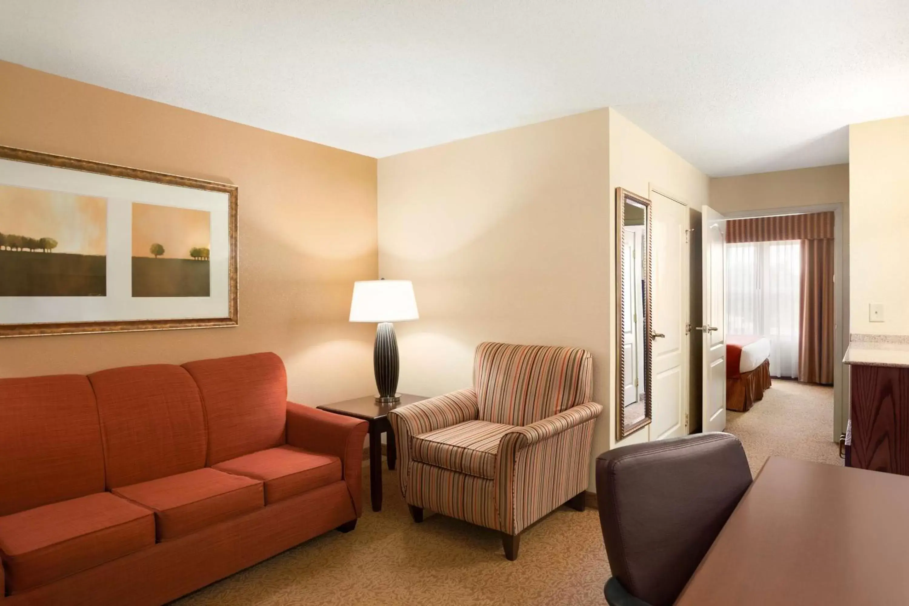 Photo of the whole room, Seating Area in Country Inn & Suites by Radisson, Lexington Park (Patuxent River Naval Air Station), MD