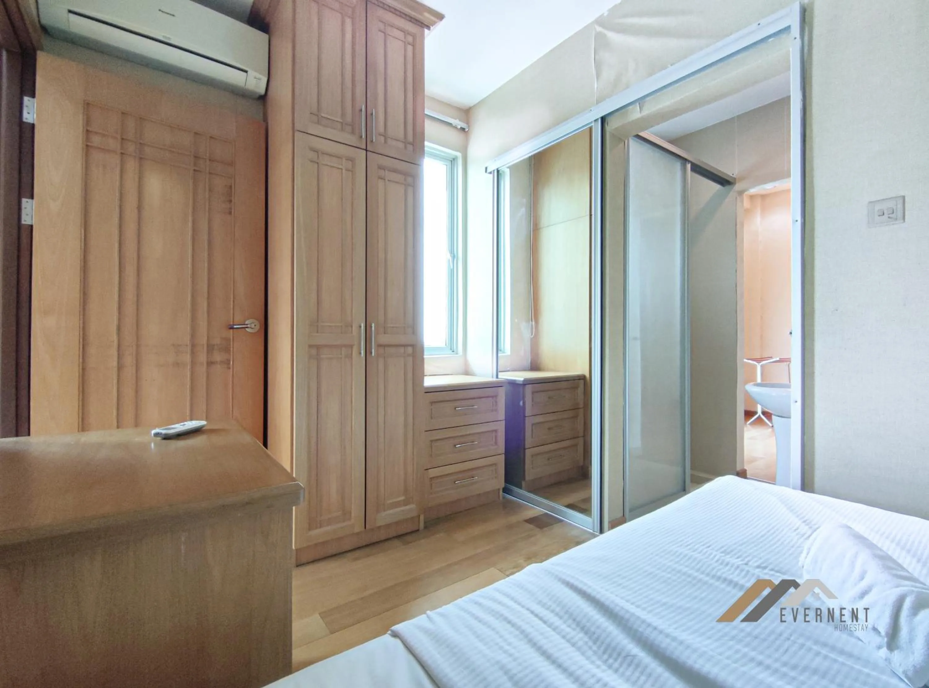 Bed in Mciti Suites by Evernent