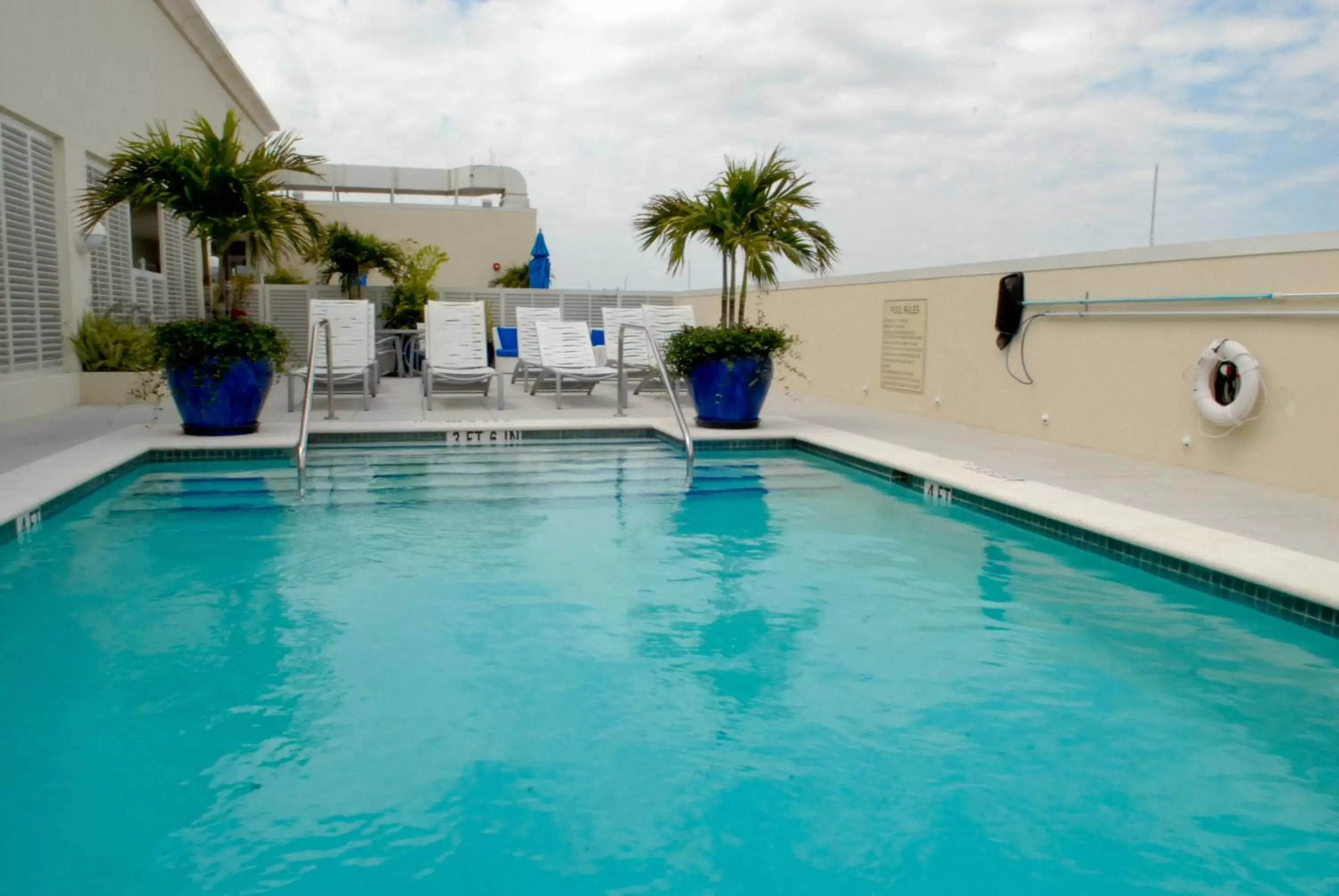 Swimming Pool in The Banyan Hotel Fort Myers, Tapestry Collection by Hilton