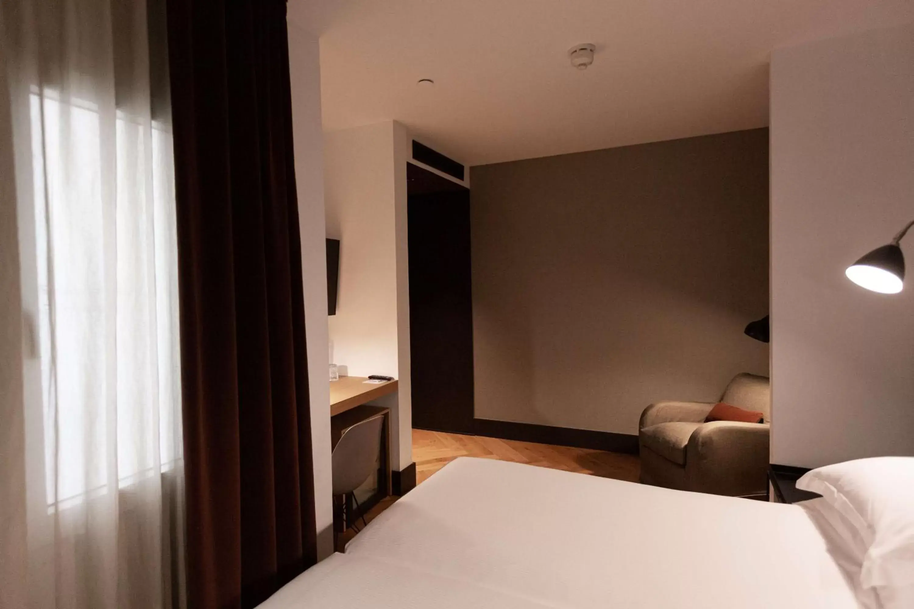 Bedroom, Bed in Alexandra Barcelona Hotel, Curio Collection by Hilton